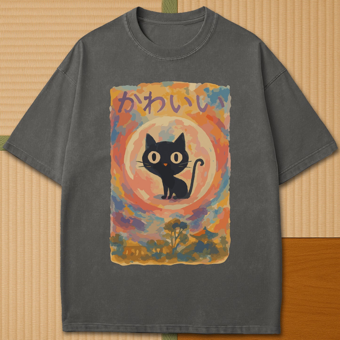 Japanese-inspired cotton Abstract Kawaii Cat Dreamscape T-Shirt in Pepper on Comfort Colors 1717, styled in a modern flatlay scene.