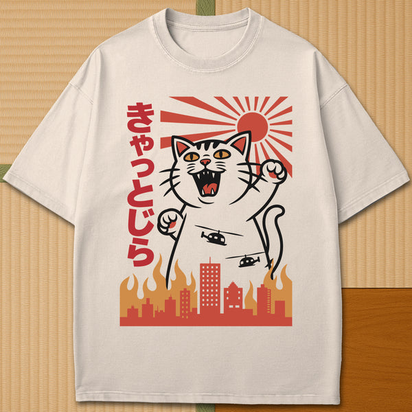 Japanese-inspired cotton Catzilla Rising Sun T-Shirt in Ivory on Comfort Colors 1717, styled in a modern flatlay scene.