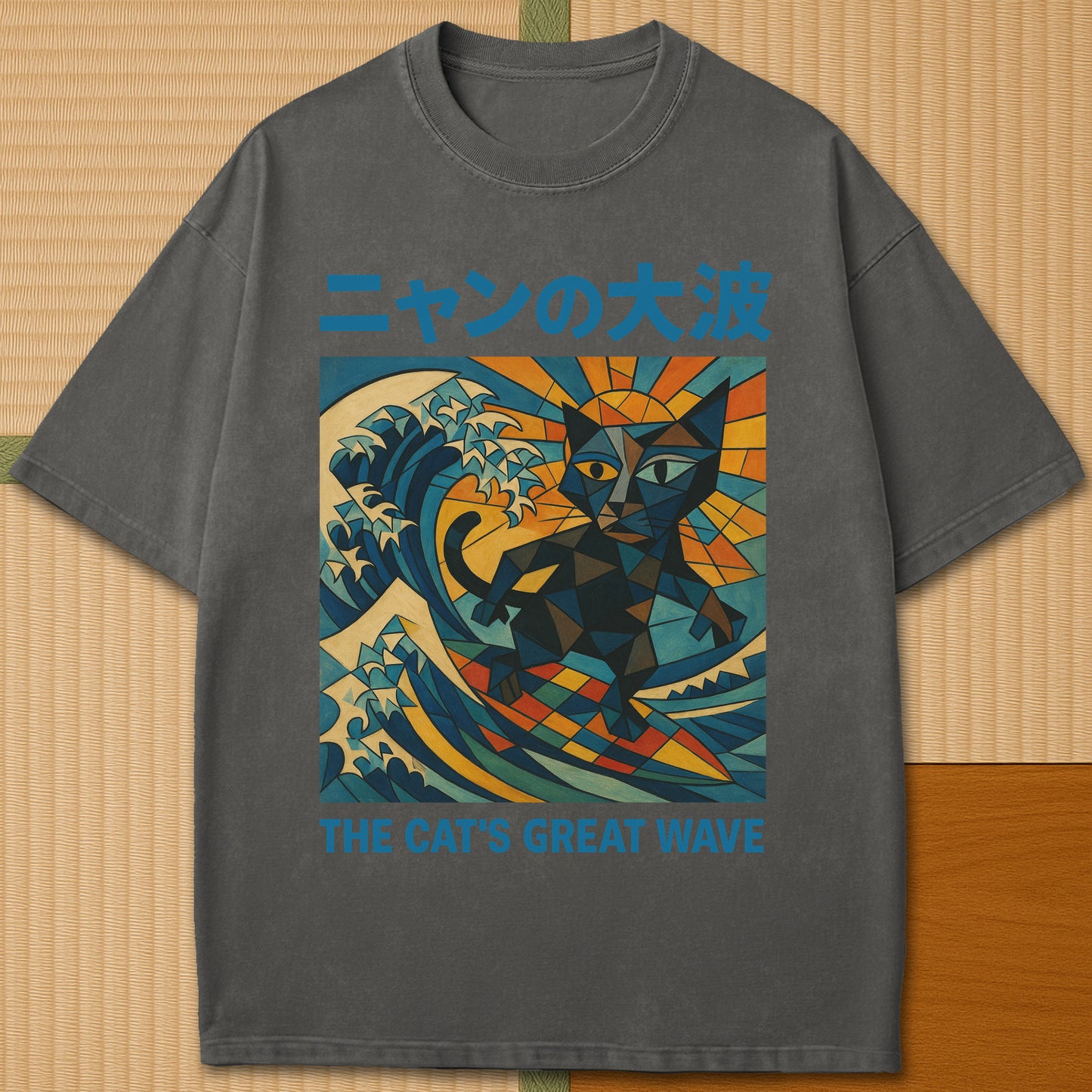 Japanese-inspired cotton Nyan No Oonami The Great Wave T-Shirt in Pepper on Comfort Colors 1717, styled in a modern flatlay scene.