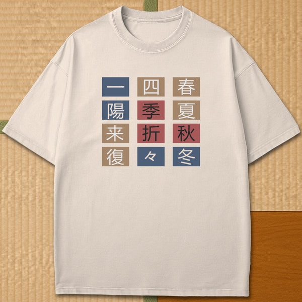 Japanese-inspired cotton The Seasons T-Shirt in Ivory on Comfort Colors 1717, styled in a modern flatlay scene.