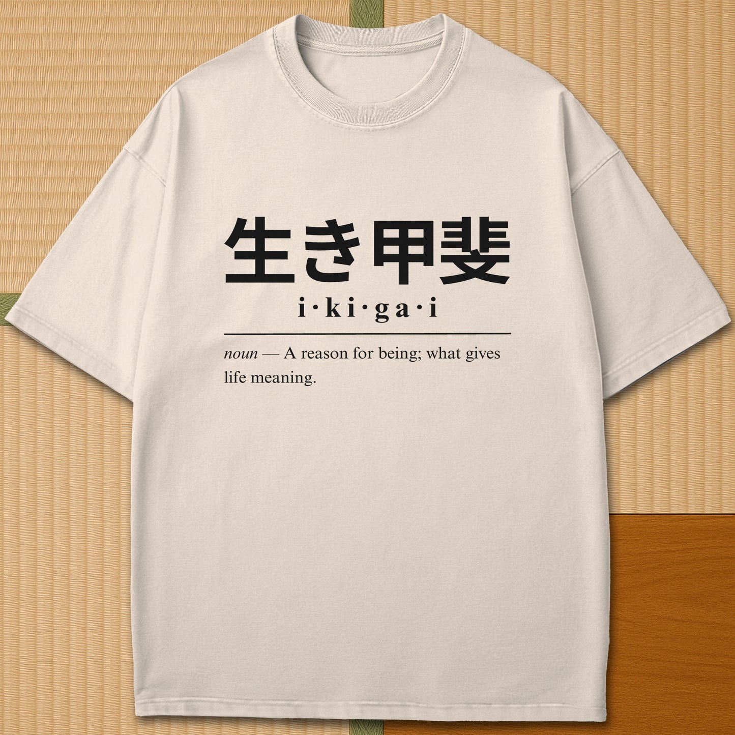 Japanese-inspired cotton Ikigai Japanese Dictionary T-Shirt in Ivory on Comfort Colors 1717, styled in a modern flatlay scene.