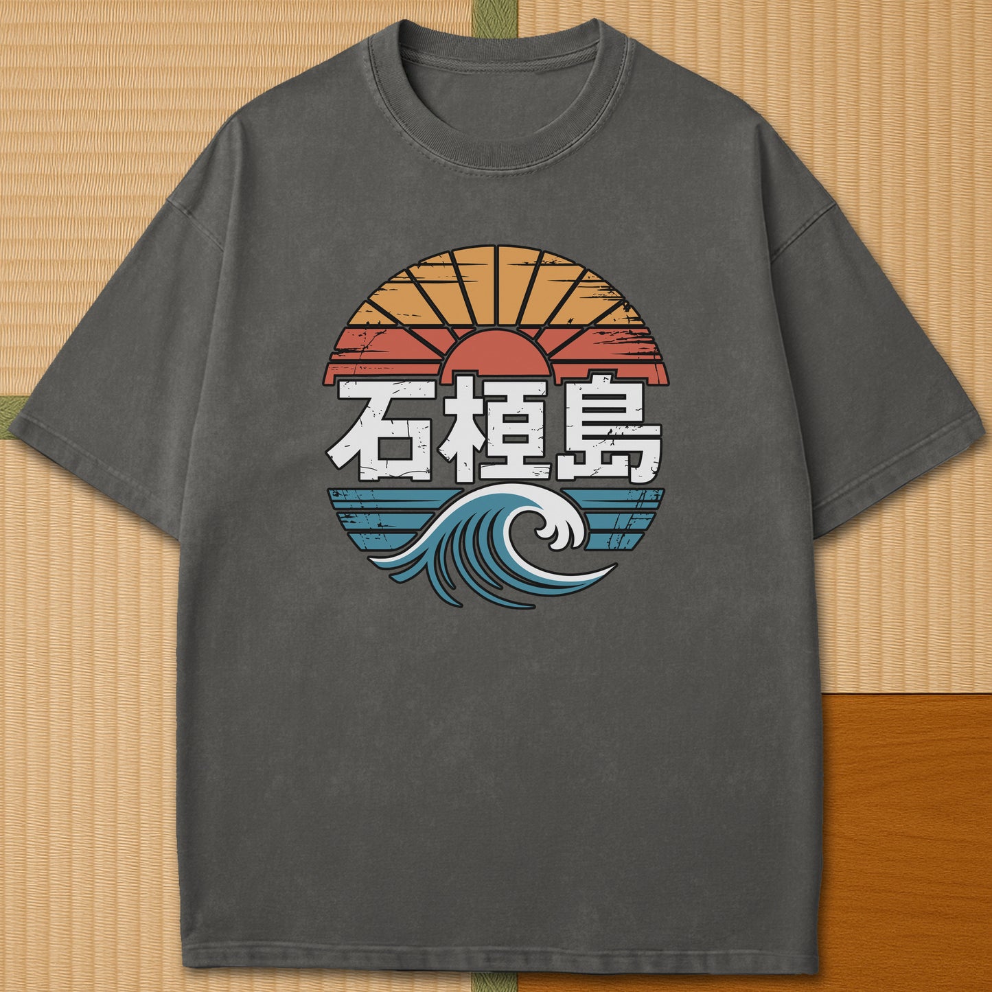 Japanese-inspired cotton Ishigaki Island Vintage Graphic Travel T-Shirt in Pepper on Comfort Colors 1717, styled in a modern flatlay scene.