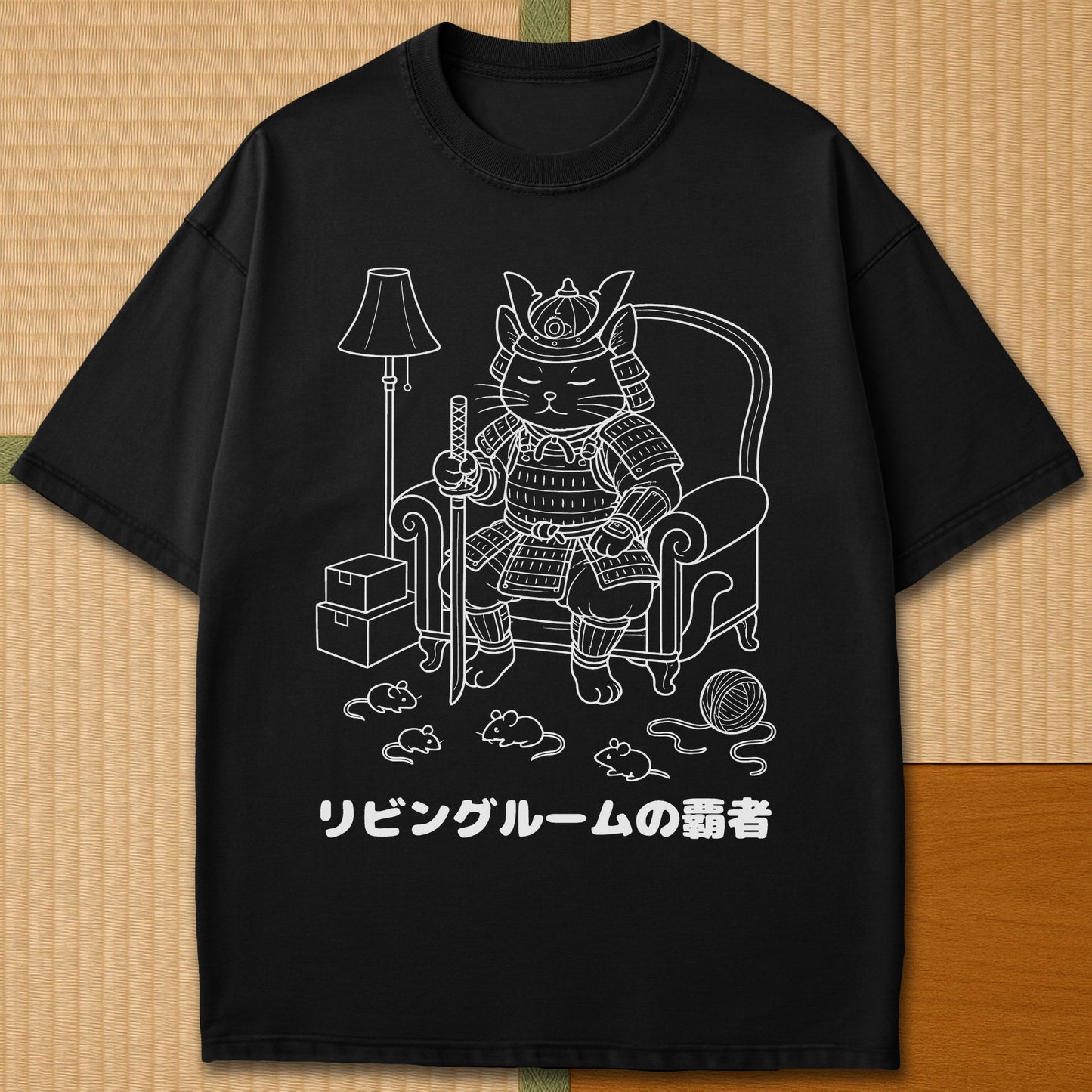 Japanese-inspired cotton The Living Room Shogun Cat T-Shirt in Black on Comfort Colors 1717, styled in a modern flatlay scene.