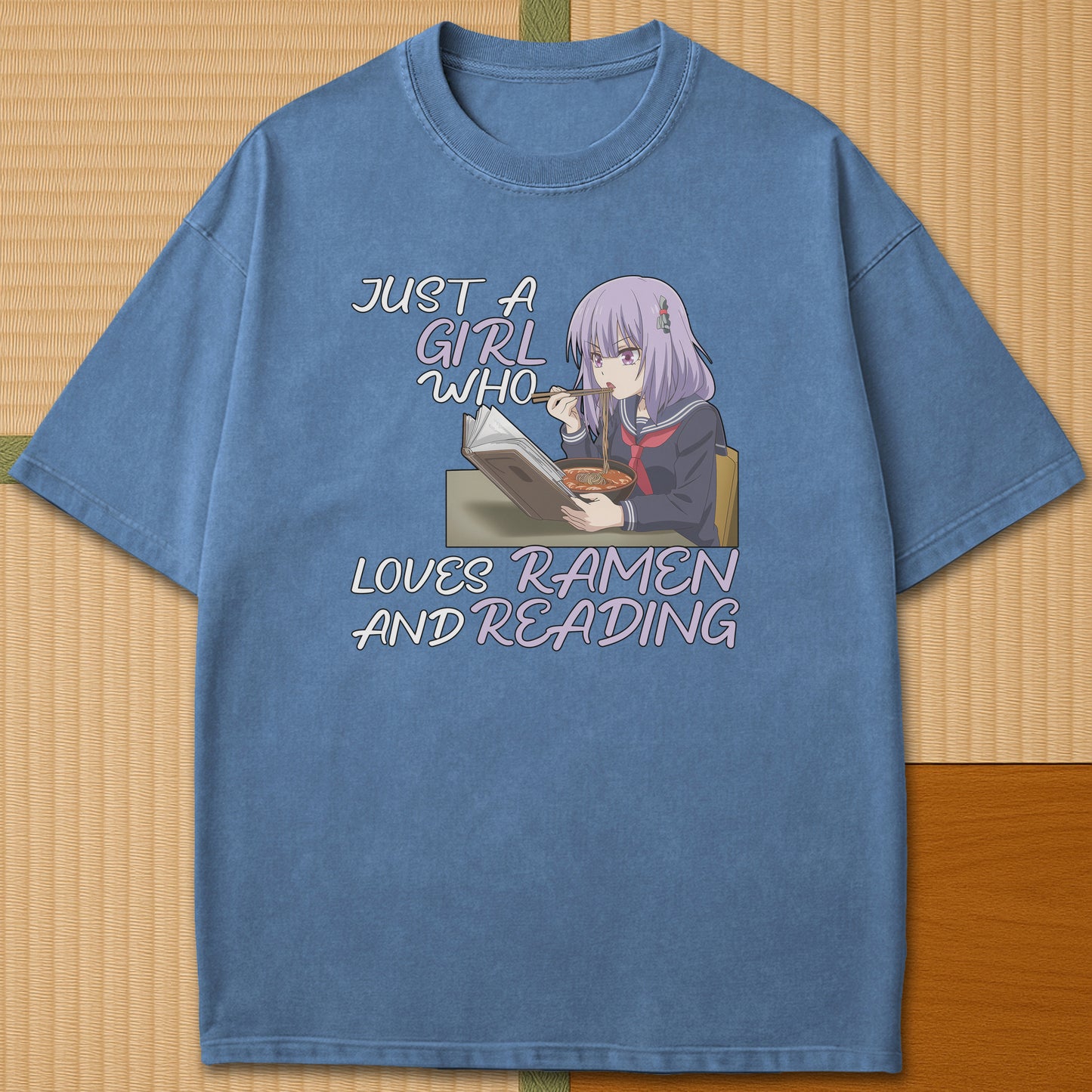 Japanese-inspired cotton Ramen And Reading T-Shirt in Blue Jean on Comfort Colors 1717, styled in a modern flatlay scene.