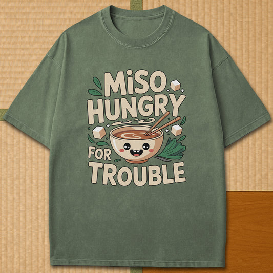Japanese-inspired cotton Miso Hungry For Trouble Kawaii Soup T-Shirt in Moss on Comfort Colors 1717, styled in a modern flatlay scene.