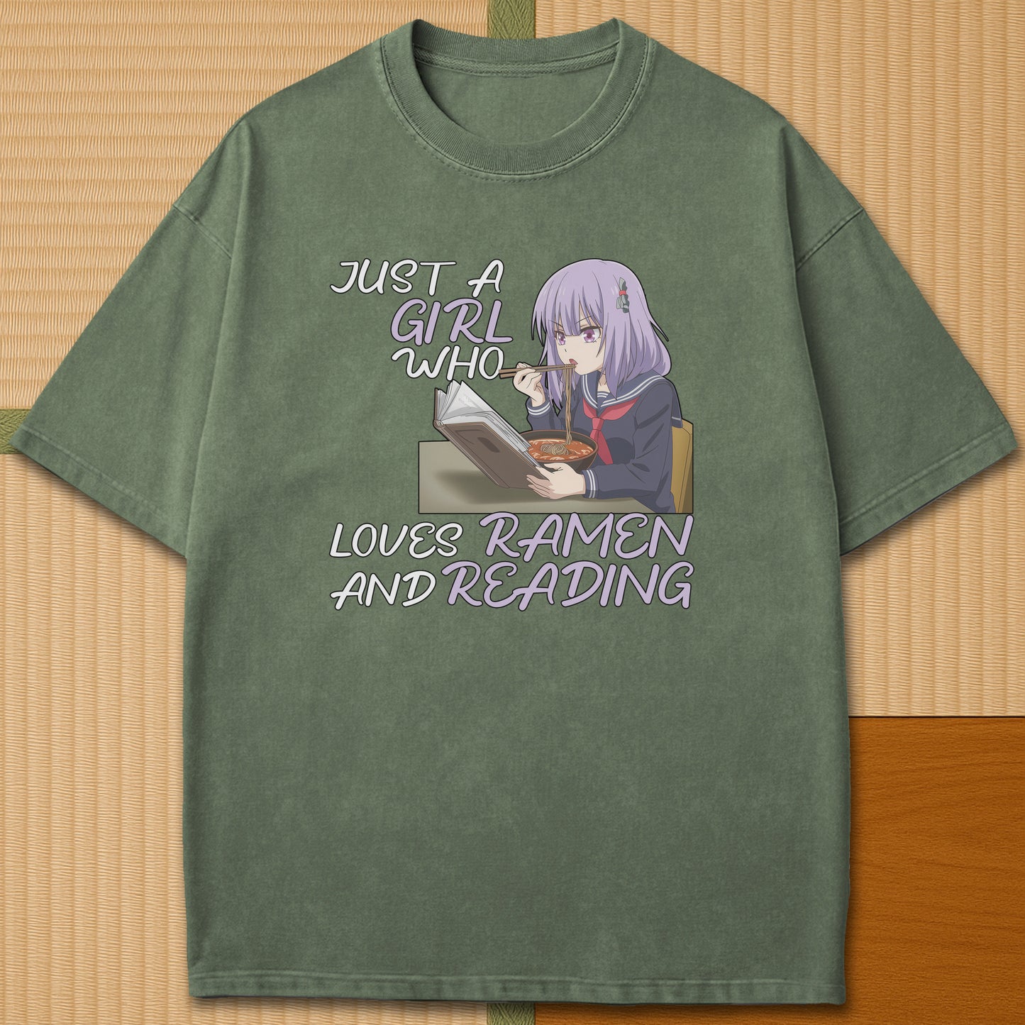 Japanese-inspired cotton Ramen And Reading T-Shirt in Moss on Comfort Colors 1717, styled in a modern flatlay scene.