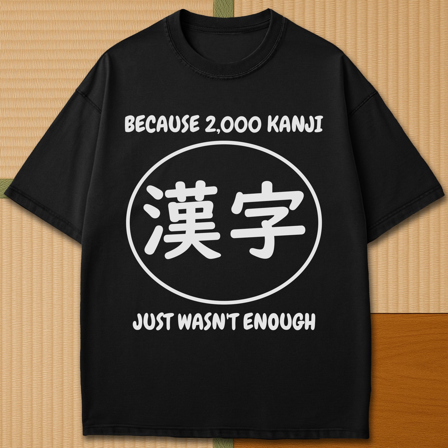Japanese-inspired cotton Never Enough Kanji T-Shirt in Black on Comfort Colors 1717, styled in a modern flatlay scene.