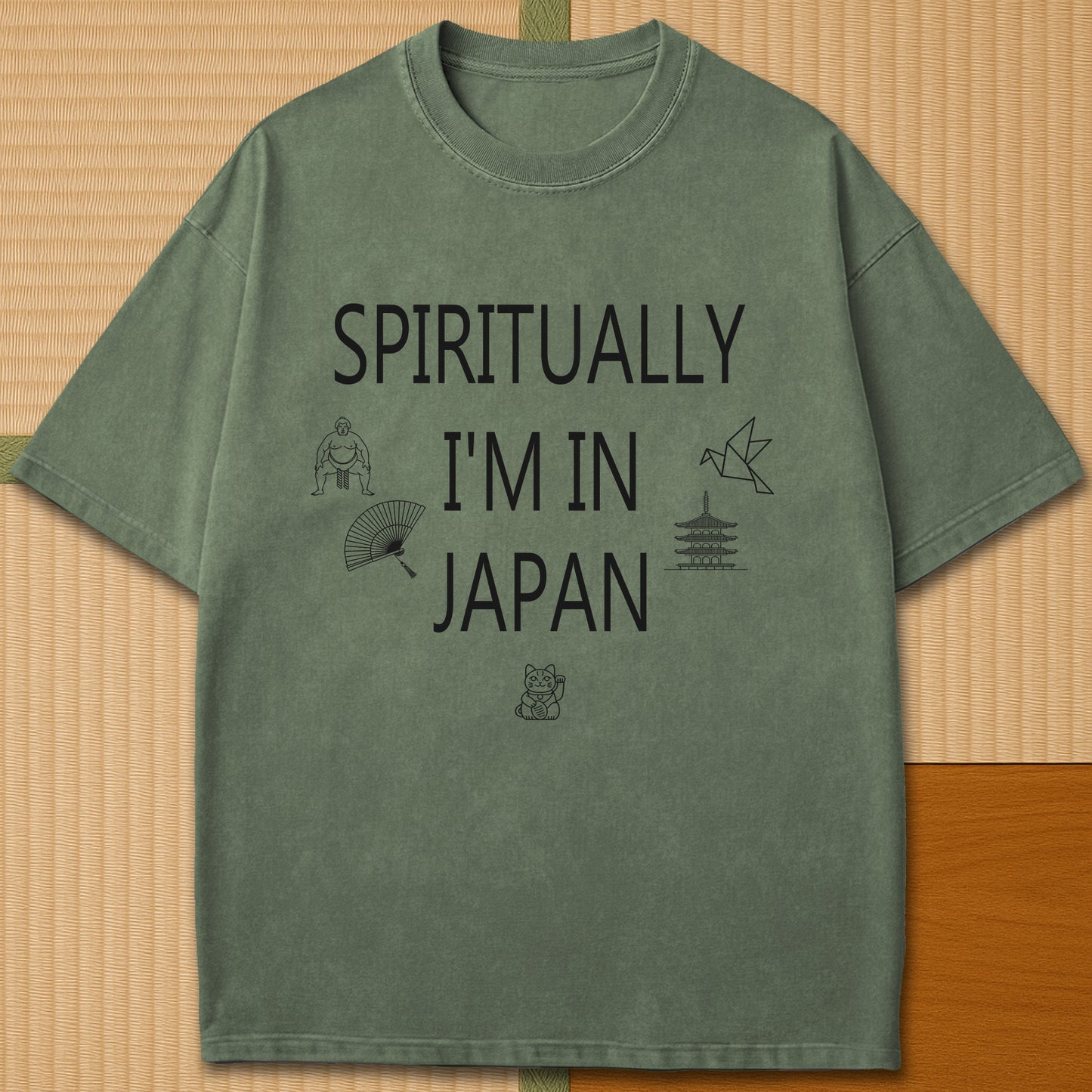 Japanese-inspired cotton Spiritually In Japan T-Shirt in Moss on Comfort Colors 1717, styled in a modern flatlay scene.