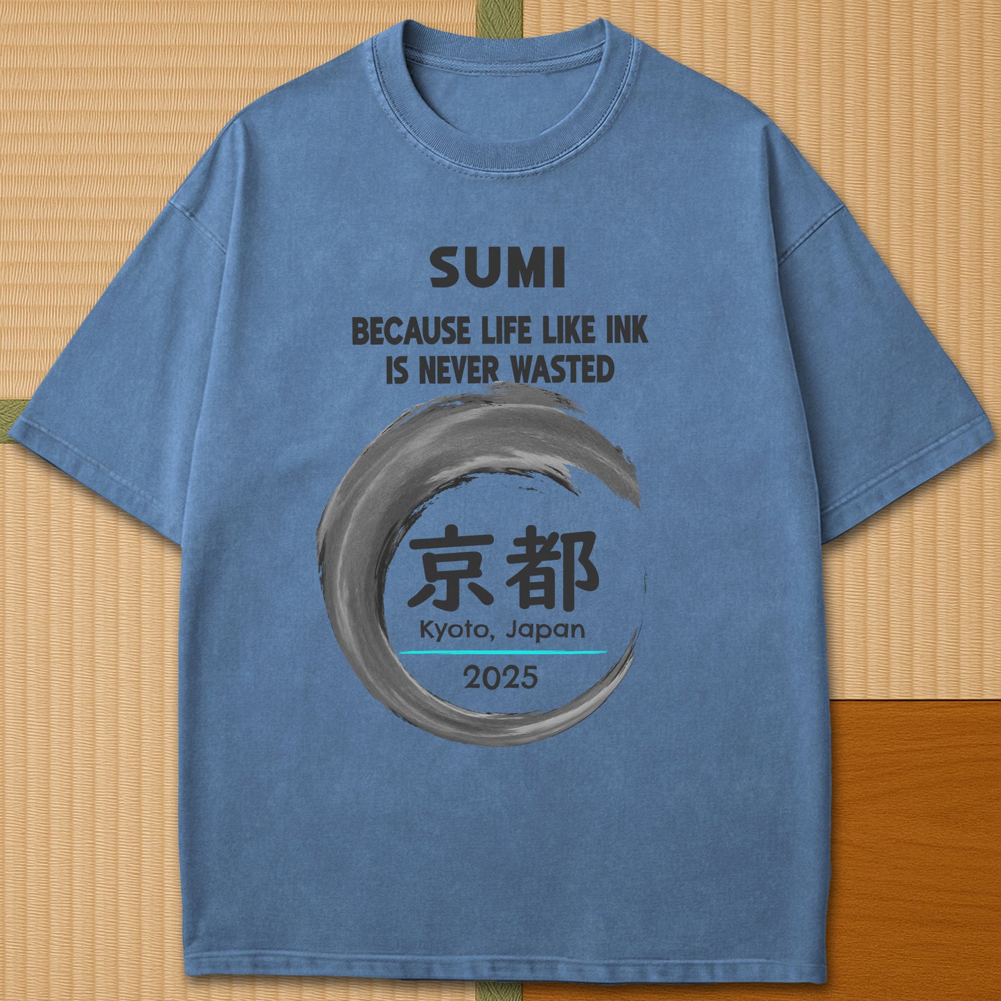 Japanese-inspired cotton Sumi Life Kyoto T-Shirt in Blue Jean on Comfort Colors 1717, styled in a modern flatlay scene.