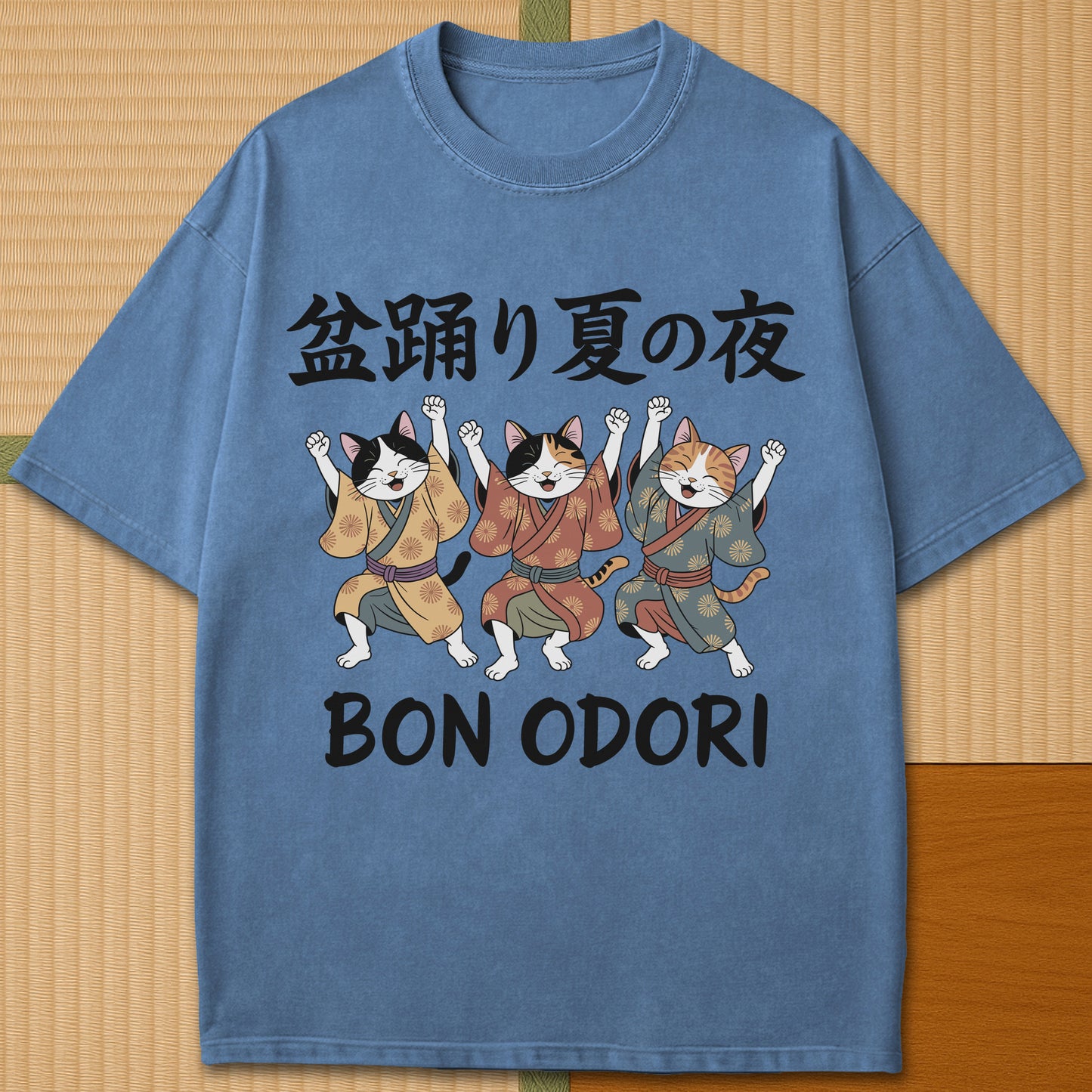 Japanese-inspired cotton Summer Night Bon Odori Cats T-Shirt in Blue Jean on Comfort Colors 1717, styled in a modern flatlay scene.