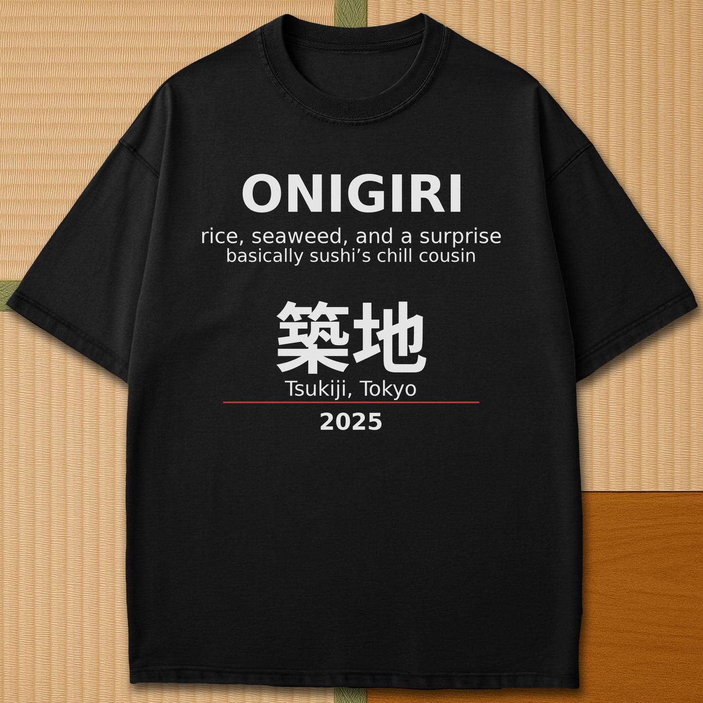 Japanese-inspired cotton Onigiri Tsukiji T-Shirt in Black on Comfort Colors 1717, styled in a modern flatlay scene.