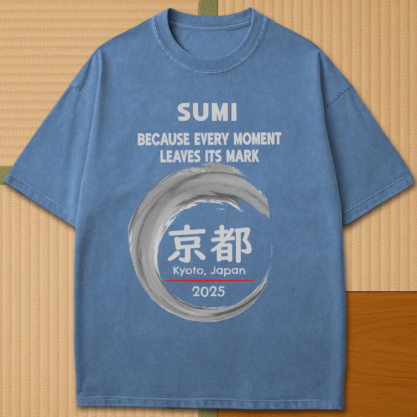 Japanese-inspired cotton Sumi Marks Kyoto T-Shirt in Blue Jean on Comfort Colors 1717, styled in a modern flatlay scene.