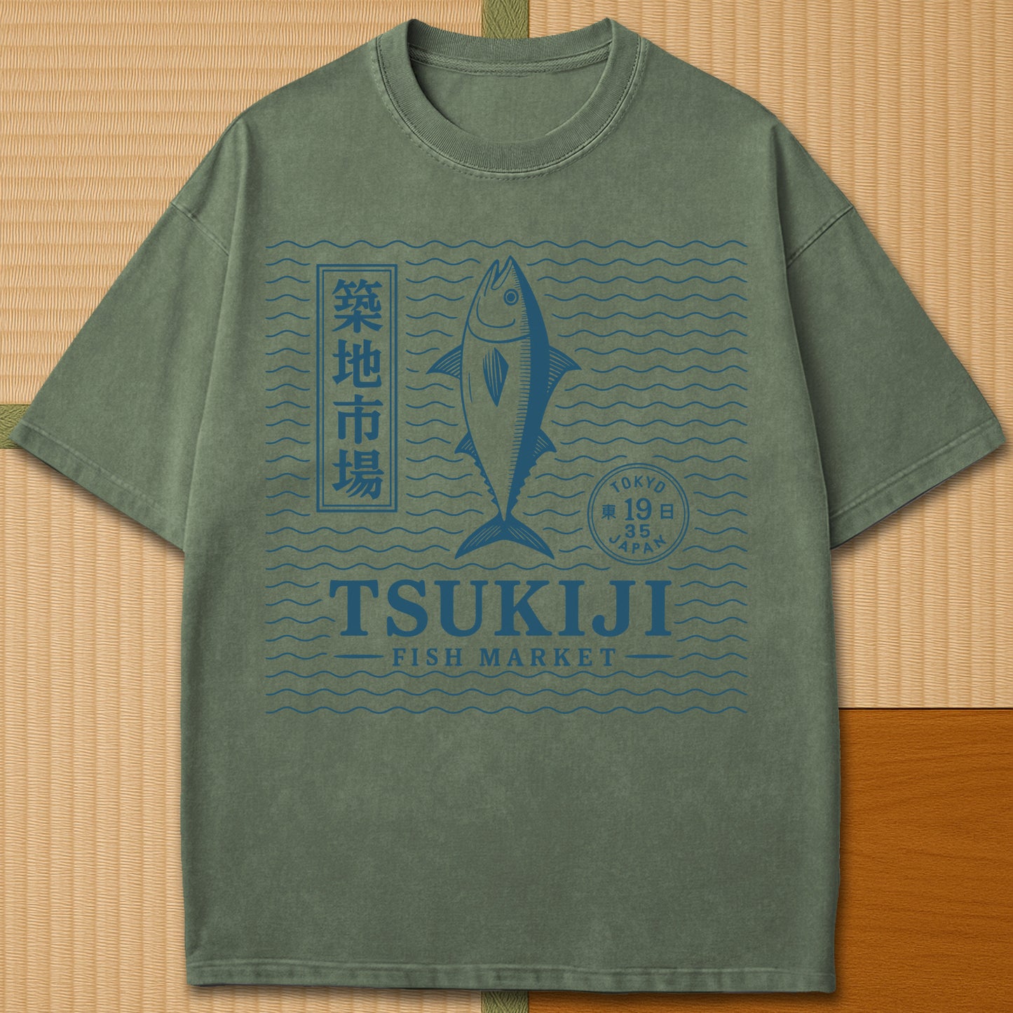 Japanese-inspired cotton Tsukiji Tuna Fish Market T-Shirt in Moss on Comfort Colors 1717, styled in a modern flatlay scene.