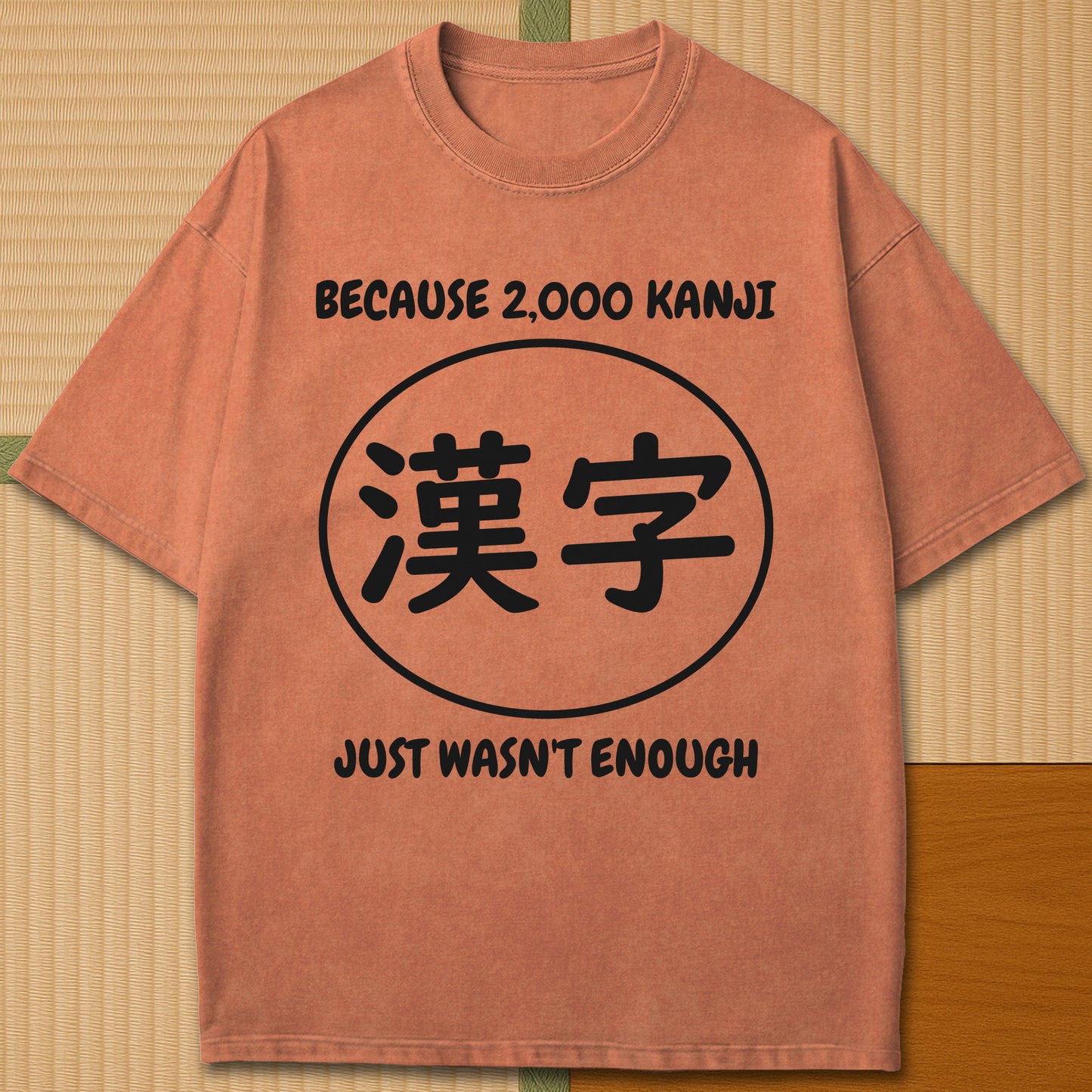 Japanese-inspired cotton Never Enough Kanji T-Shirt in Yam on Comfort Colors 1717, styled in a modern flatlay scene.
