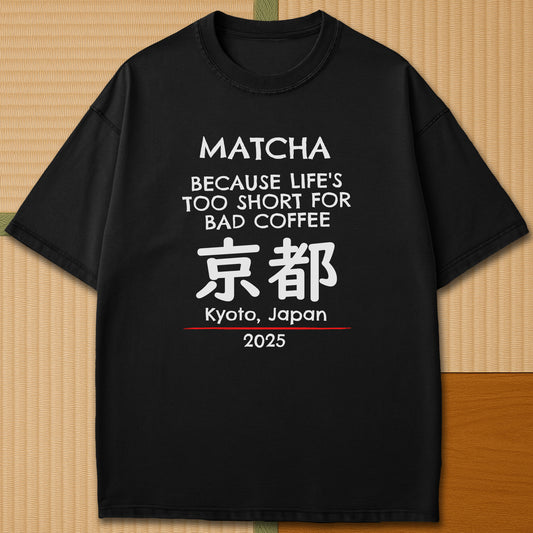 Japanese-inspired cotton Matcha Tokyo T-Shirt in Black on Comfort Colors 1717, styled in a modern flatlay scene.