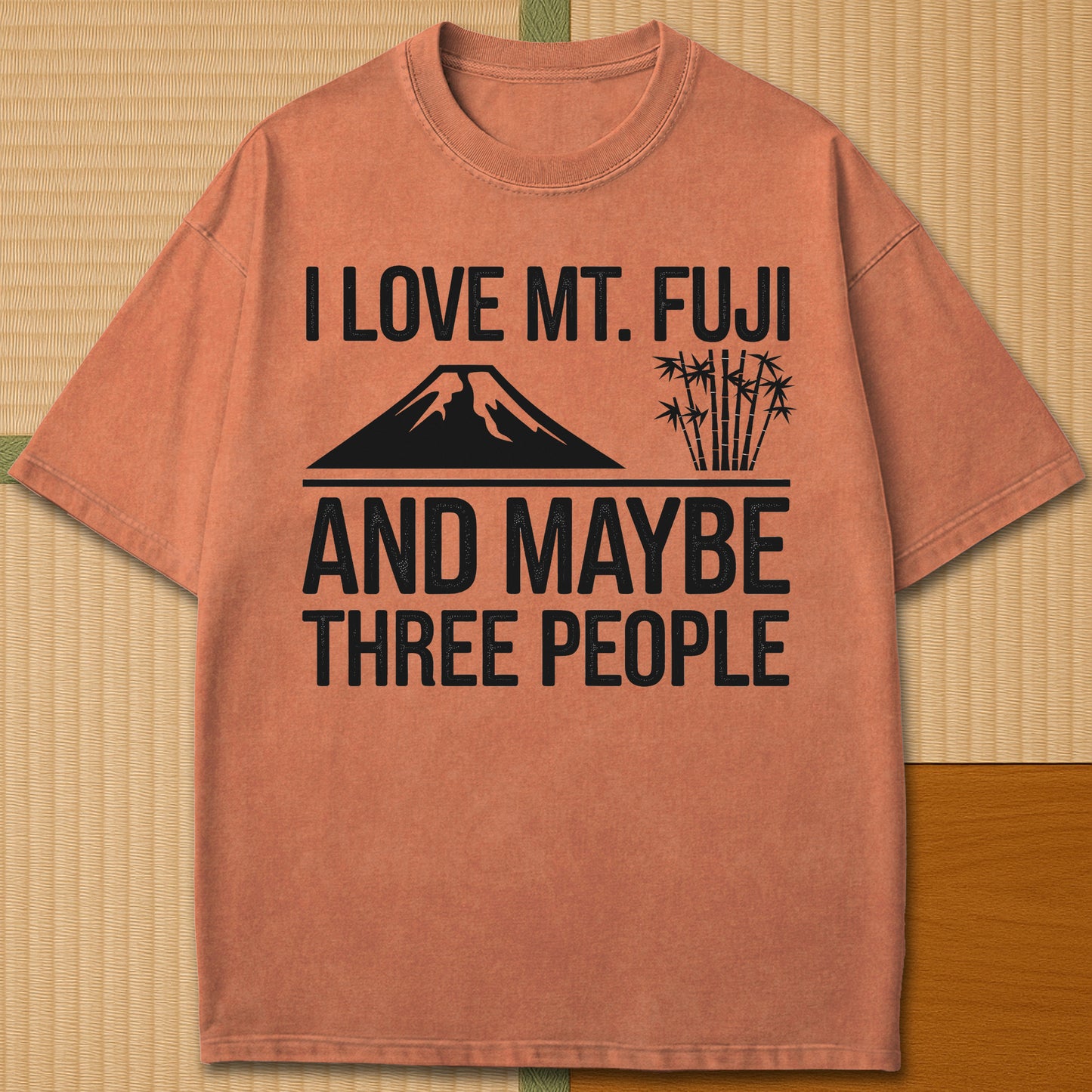Japanese-inspired cotton I Love Mt Fuji And Maybe Three People T-Shirt in Yam on Comfort Colors 1717, styled in a modern flatlay scene.