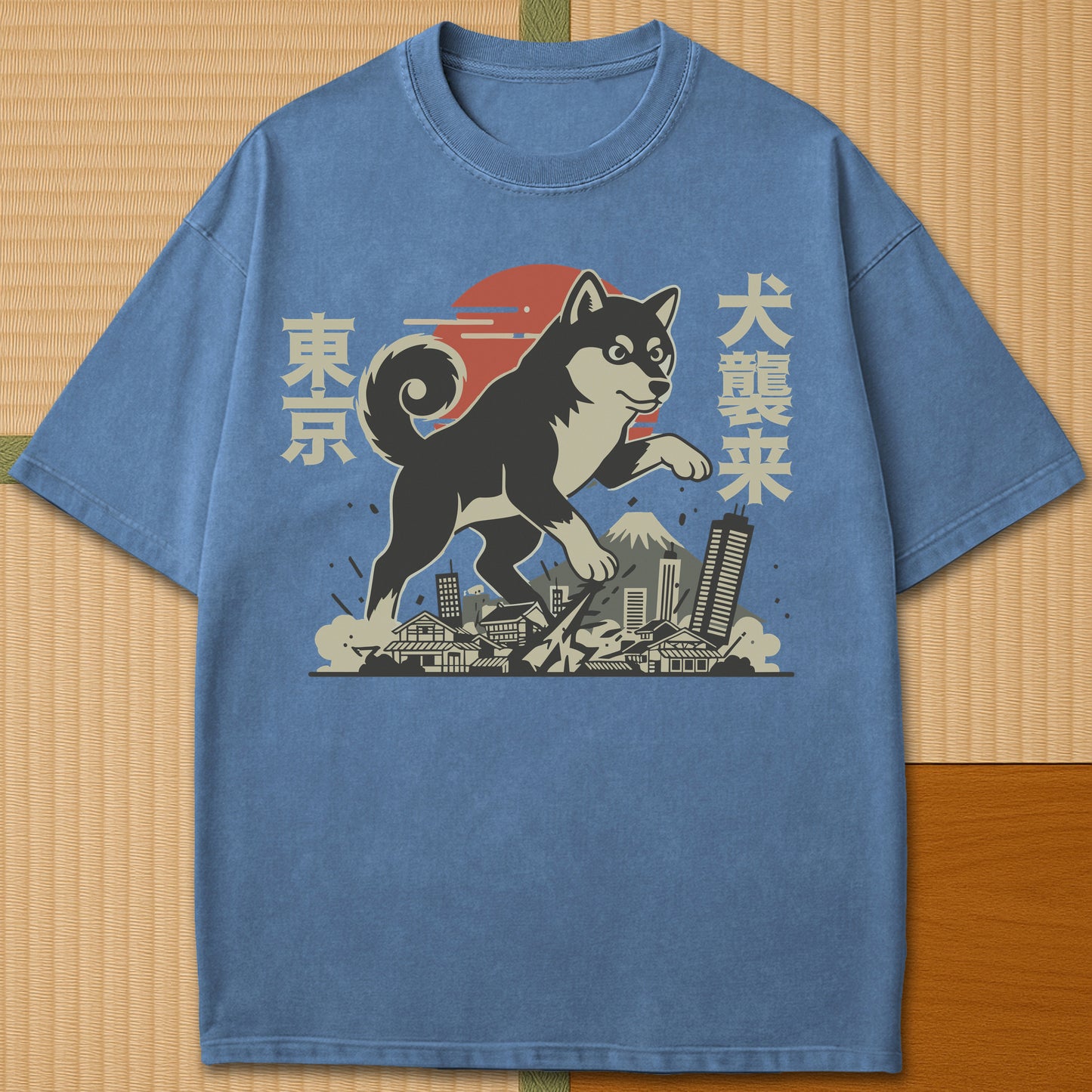 Japanese-inspired cotton Terror Dog Invades Tokyo T-Shirt in Blue Jean on Comfort Colors 1717, styled in a modern flatlay scene.