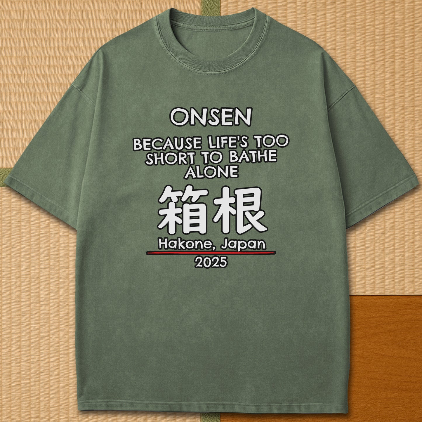 Japanese-inspired cotton Onsen Hakone T-Shirt in Moss on Comfort Colors 1717, styled in a modern flatlay scene.