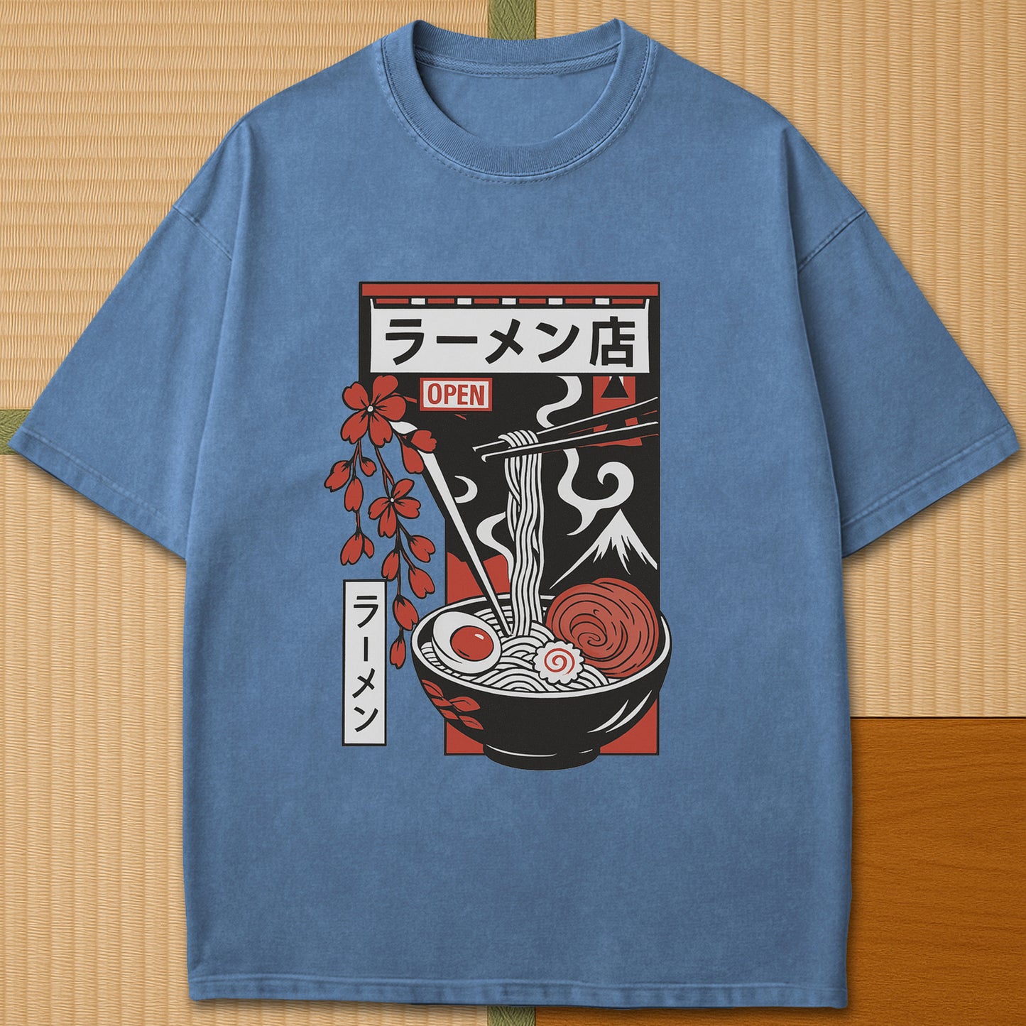 Japanese-inspired cotton Japanese Ramen Bowl T-Shirt in Blue Jean on Comfort Colors 1717, styled in a modern flatlay scene.