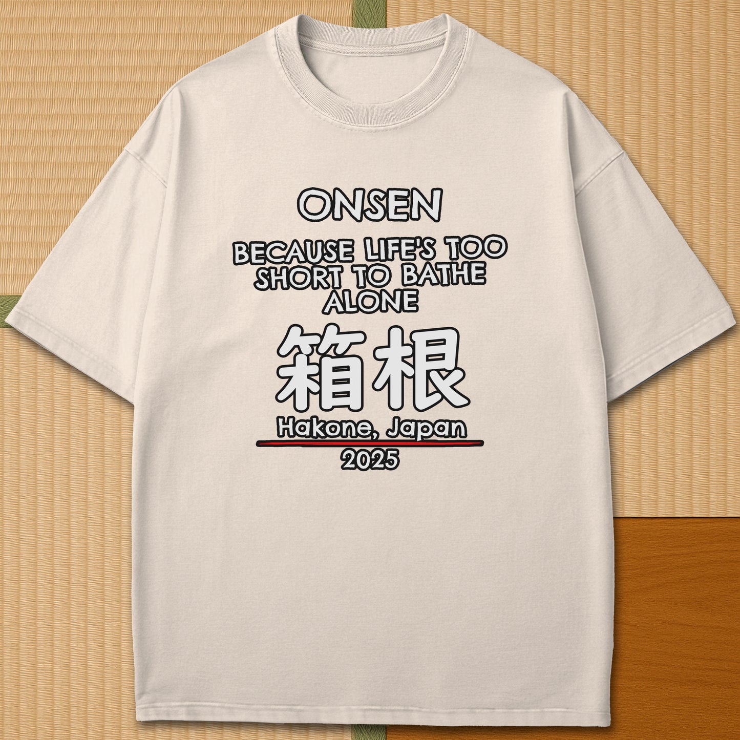 Japanese-inspired cotton Onsen Hakone T-Shirt in Ivory on Comfort Colors 1717, styled in a modern flatlay scene.