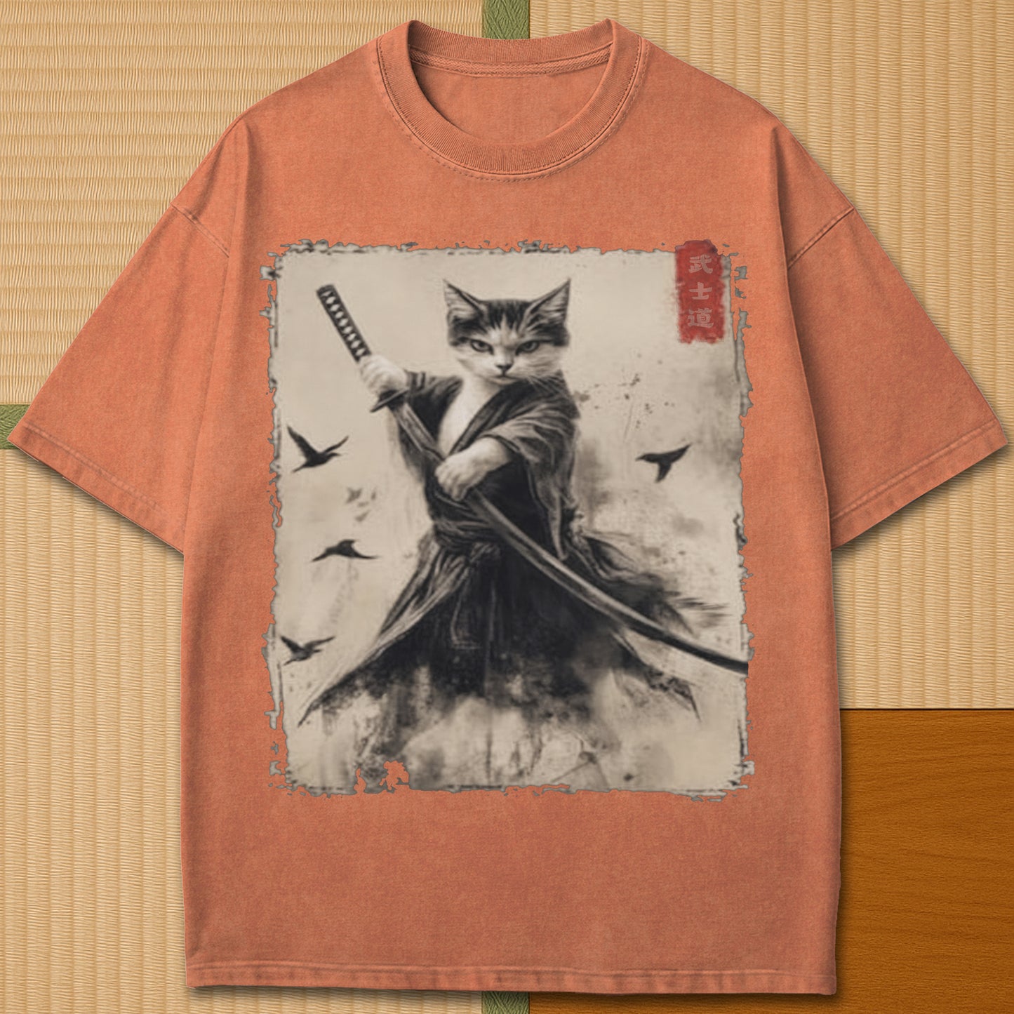 Japanese-inspired cotton Cat Samurai T-Shirt in Yam on Comfort Colors 1717, styled in a modern flatlay scene.