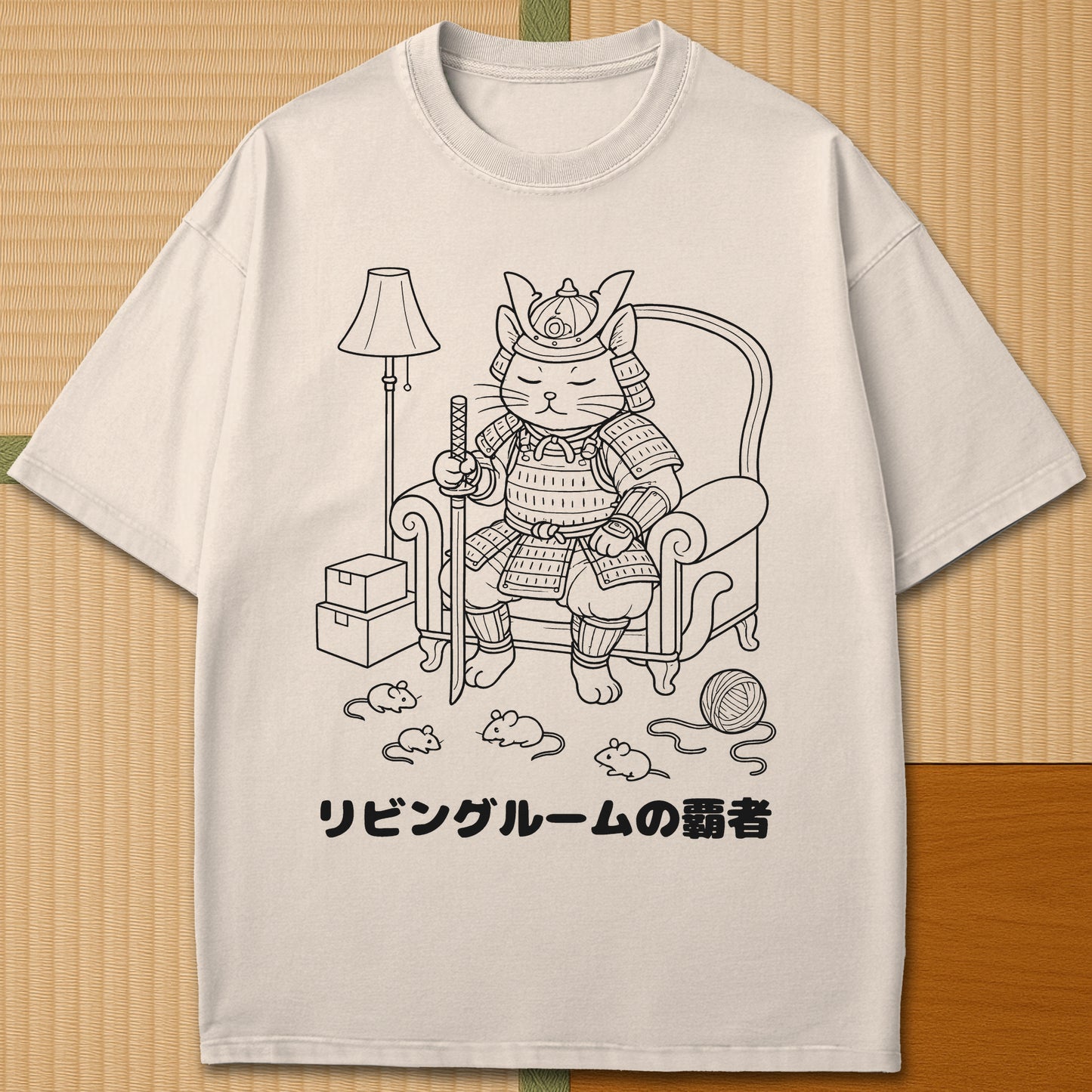 Japanese-inspired cotton The Living Room Shogun Cat T-Shirt in Ivory on Comfort Colors 1717, styled in a modern flatlay scene.