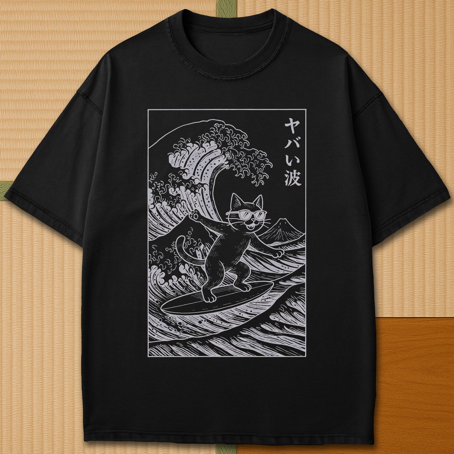 Japanese-inspired cotton Yabai Wave Cat T-Shirt in Black on Comfort Colors 1717, styled in a modern flatlay scene.