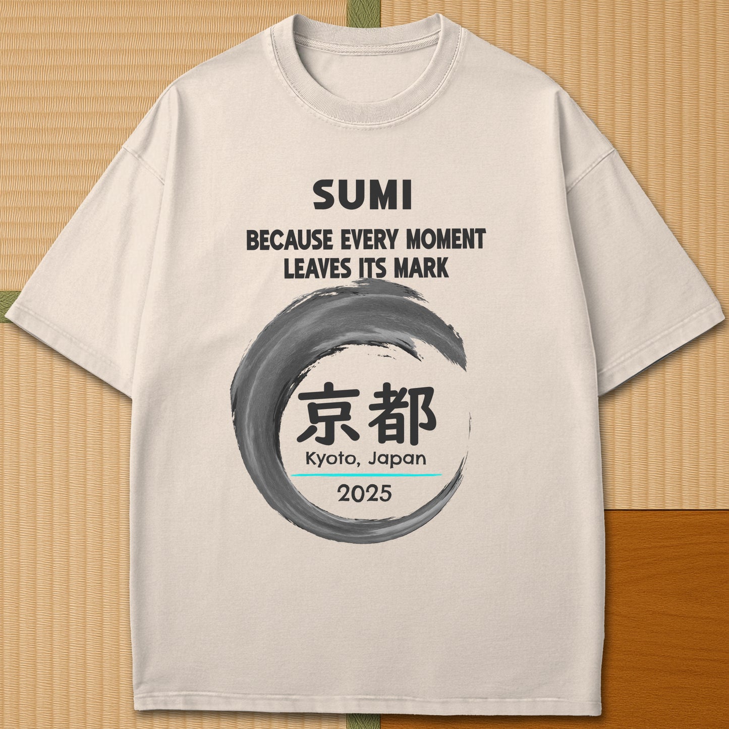 Japanese-inspired cotton Sumi Marks Kyoto T-Shirt in Ivory on Comfort Colors 1717, styled in a modern flatlay scene.
