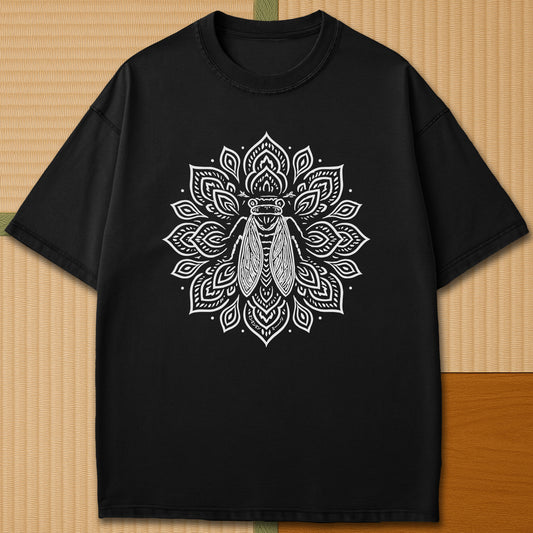 Japanese-inspired cotton Cicada Mandala T-Shirt in Black on Comfort Colors 1717, styled in a modern flatlay scene.