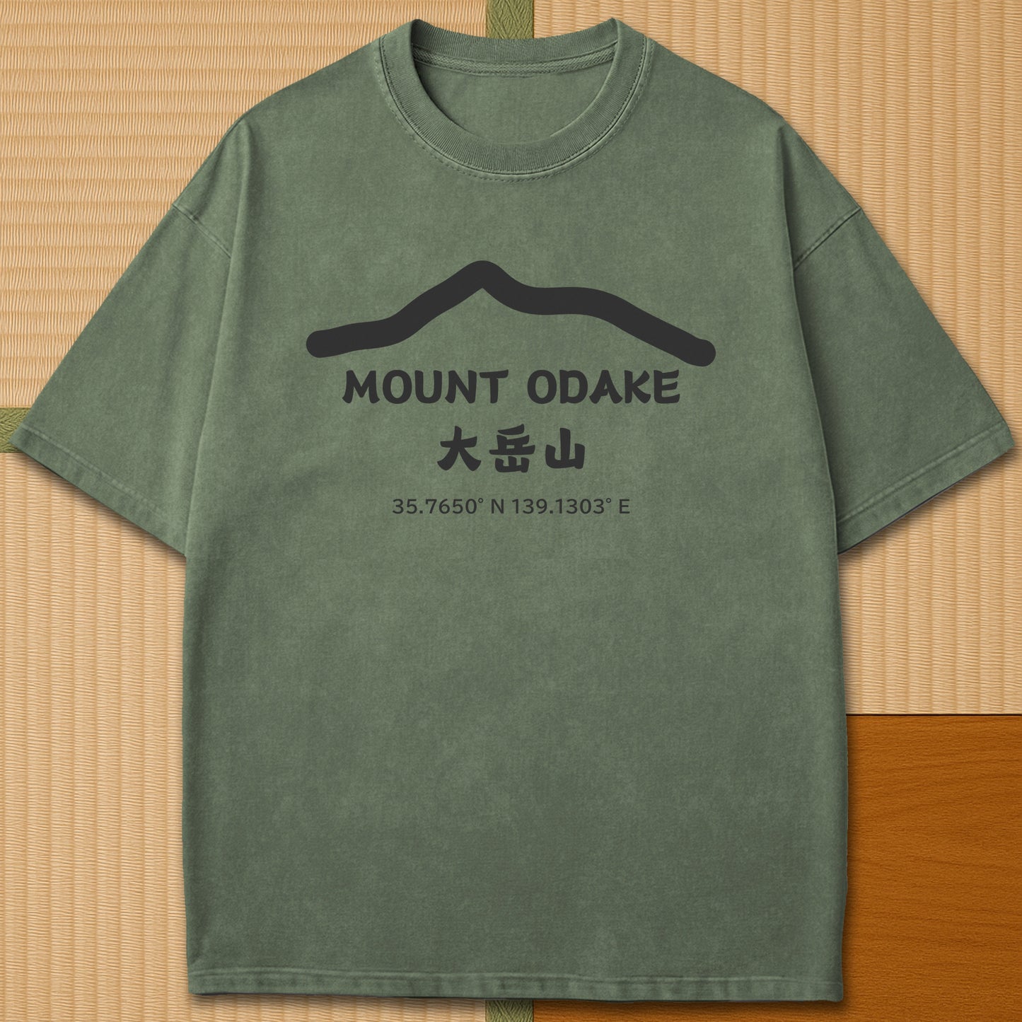 Japanese-inspired cotton Mount Odake T-Shirt in Moss on Comfort Colors 1717, styled in a modern flatlay scene.