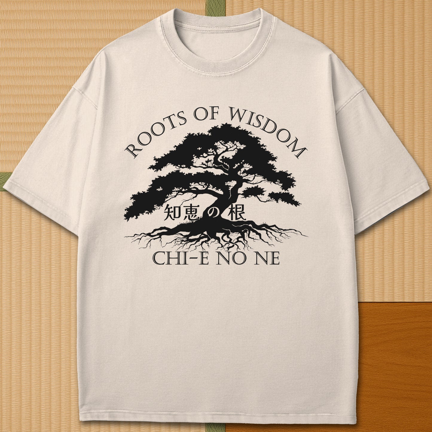 Japanese-inspired cotton Roots Of Wisdom T-Shirt in Ivory on Comfort Colors 1717, styled in a modern flatlay scene.