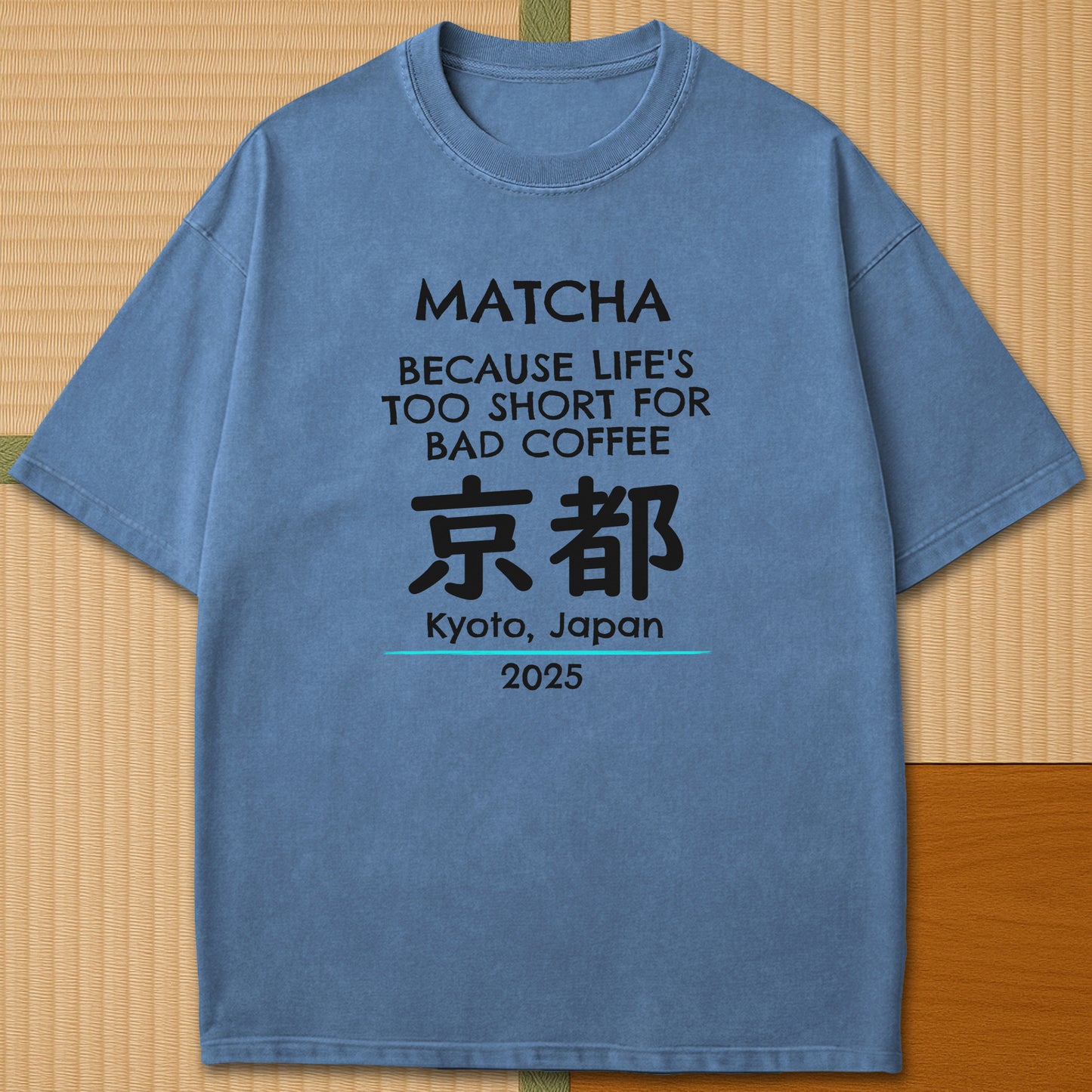 Japanese-inspired cotton Matcha Tokyo T-Shirt in Blue Jean on Comfort Colors 1717, styled in a modern flatlay scene.