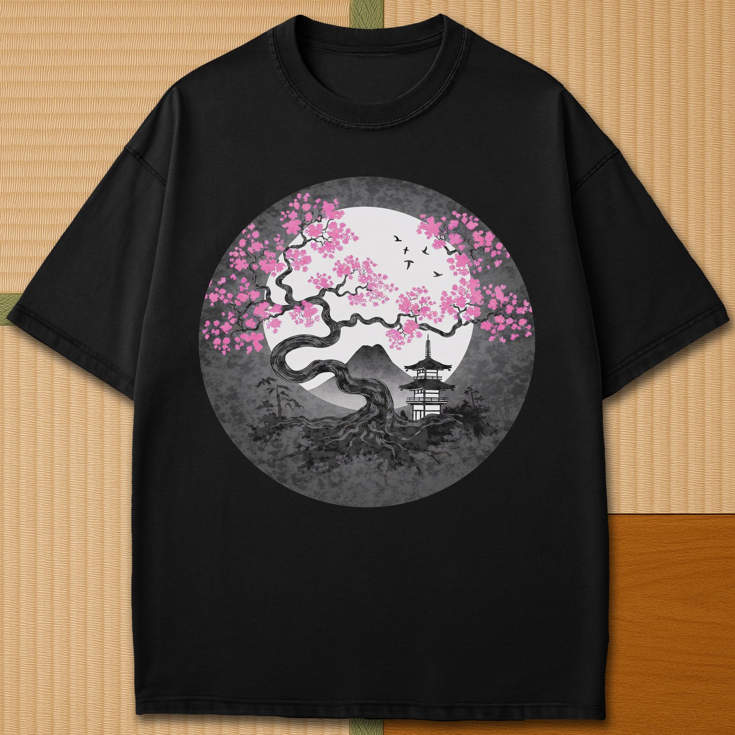 Japanese-inspired cotton Sakura Near Fuji T-Shirt in Black on Comfort Colors 1717, styled in a modern flatlay scene.