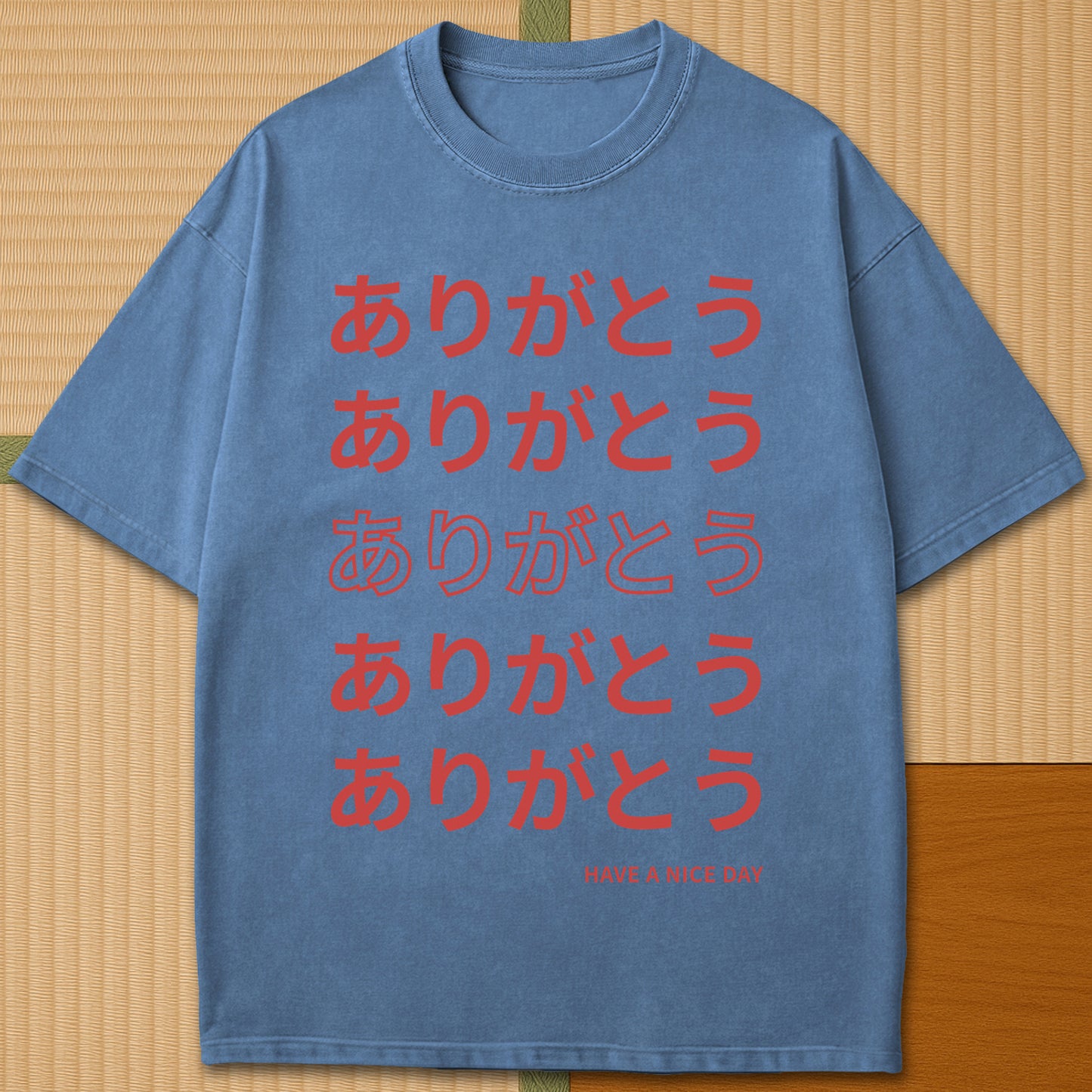 Japanese-inspired cotton Echoes Of Thank You T-Shirt in Blue Jean on Comfort Colors 1717, styled in a modern flatlay scene.