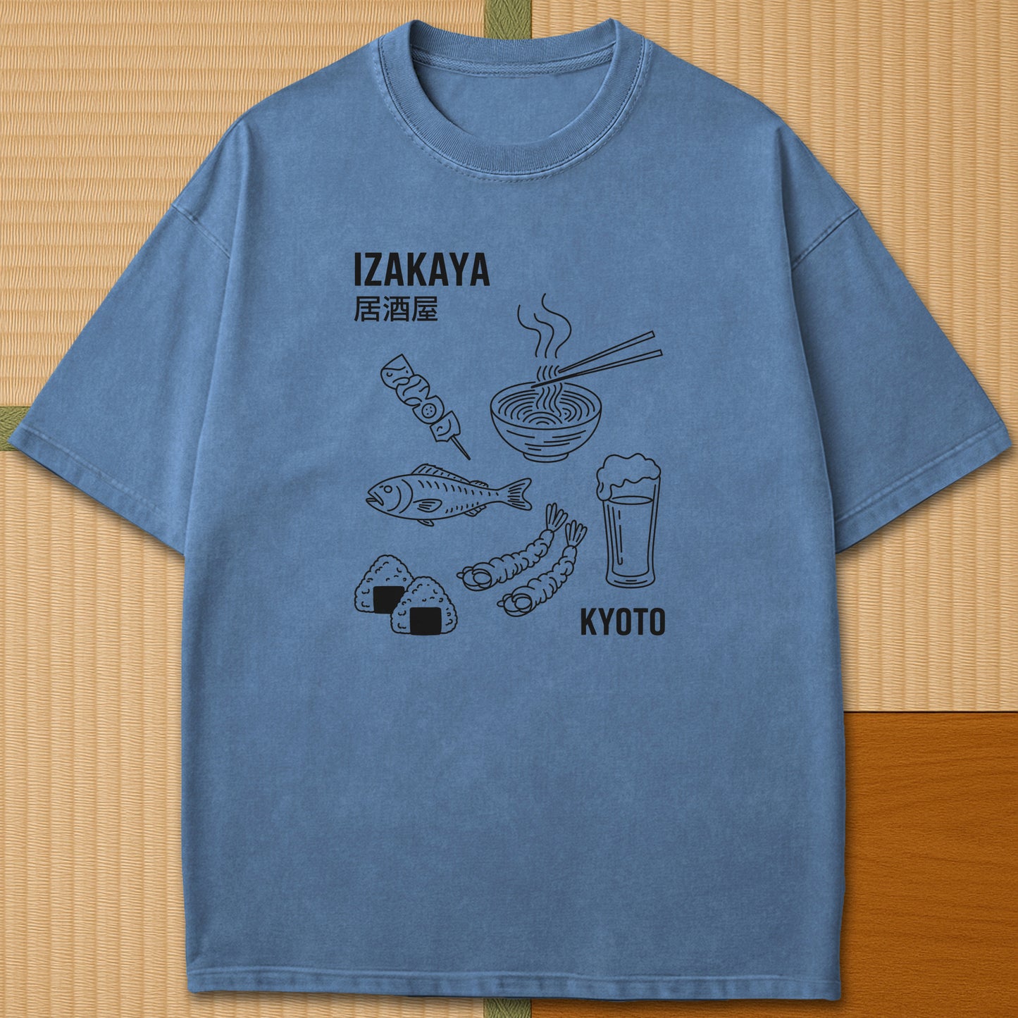 Japanese-inspired cotton Izakaya Japanese Foodie T-Shirt in Blue Jean on Comfort Colors 1717, styled in a modern flatlay scene.
