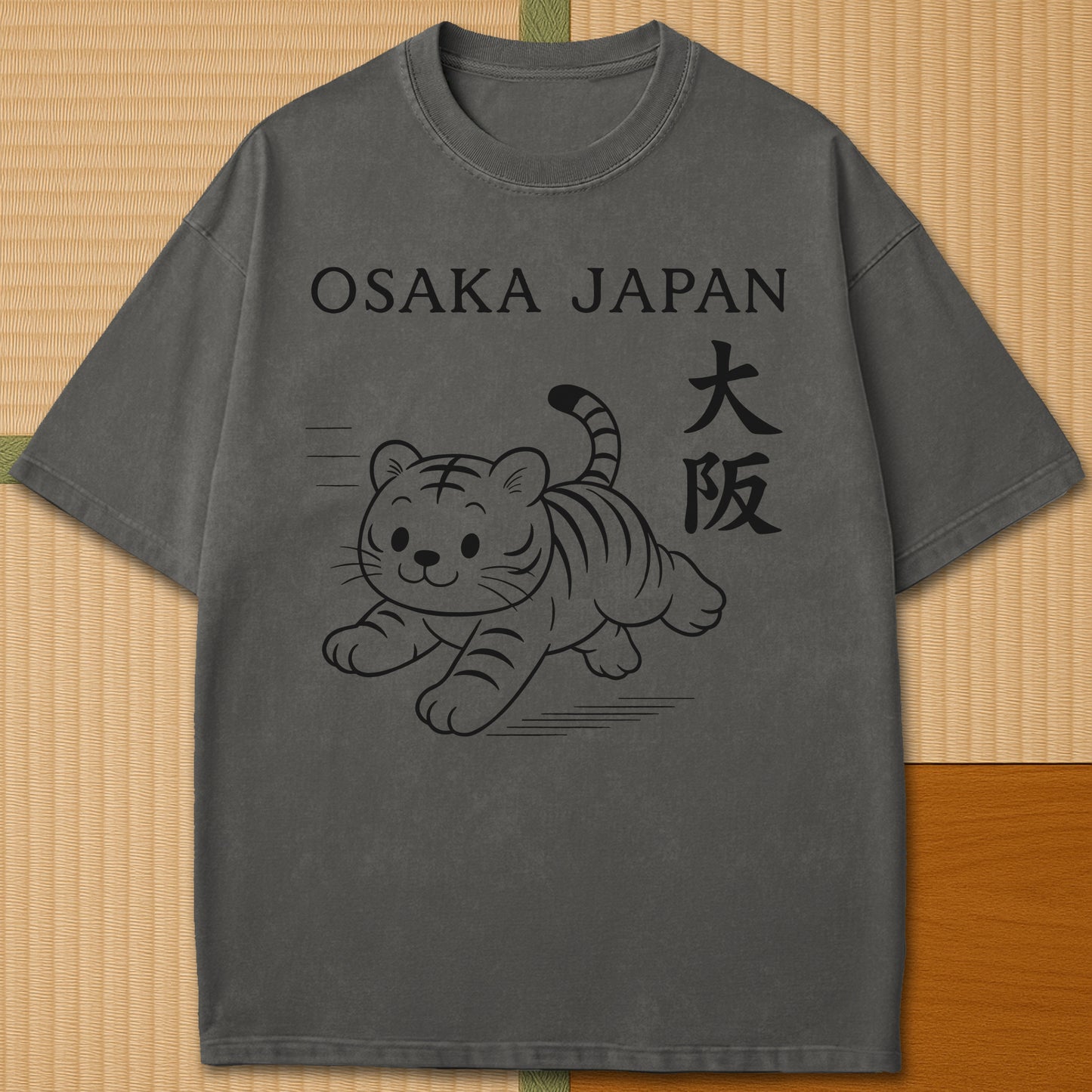 Japanese-inspired cotton Osaka Tiger T-Shirt in Pepper on Comfort Colors 1717, styled in a modern flatlay scene.