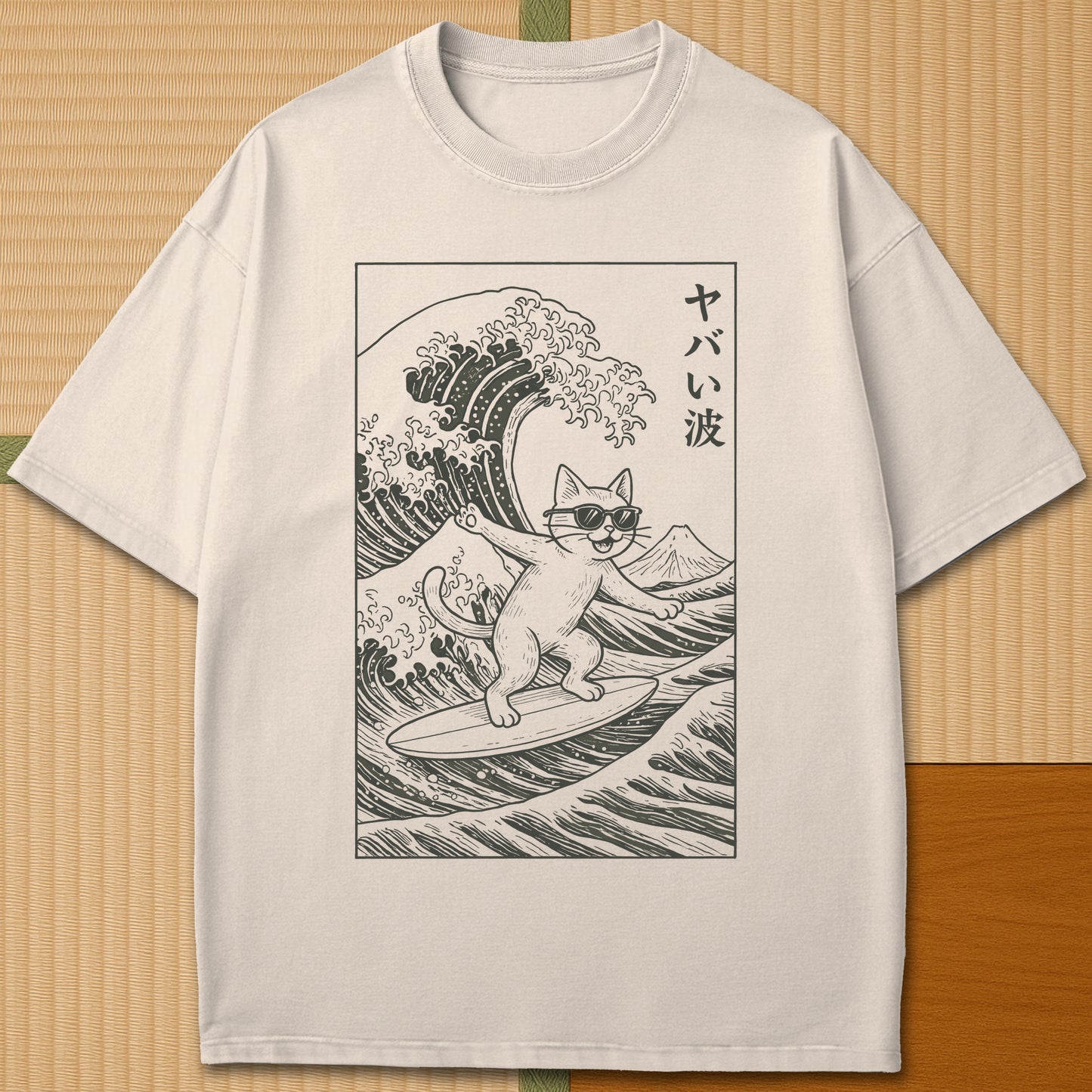 Japanese-inspired cotton Yabai Wave Cat T-Shirt in Ivory on Comfort Colors 1717, styled in a modern flatlay scene.