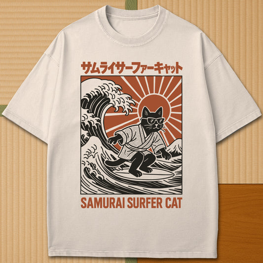 Japanese-inspired cotton Samurai Surfer Cat T-Shirt in Ivory on Comfort Colors 1717, styled in a modern flatlay scene.