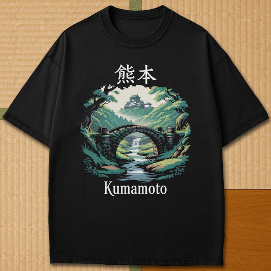 Japanese-inspired cotton Bridge To Kumamoto Castle T-Shirt in Black on Comfort Colors 1717, styled in a modern flatlay scene.