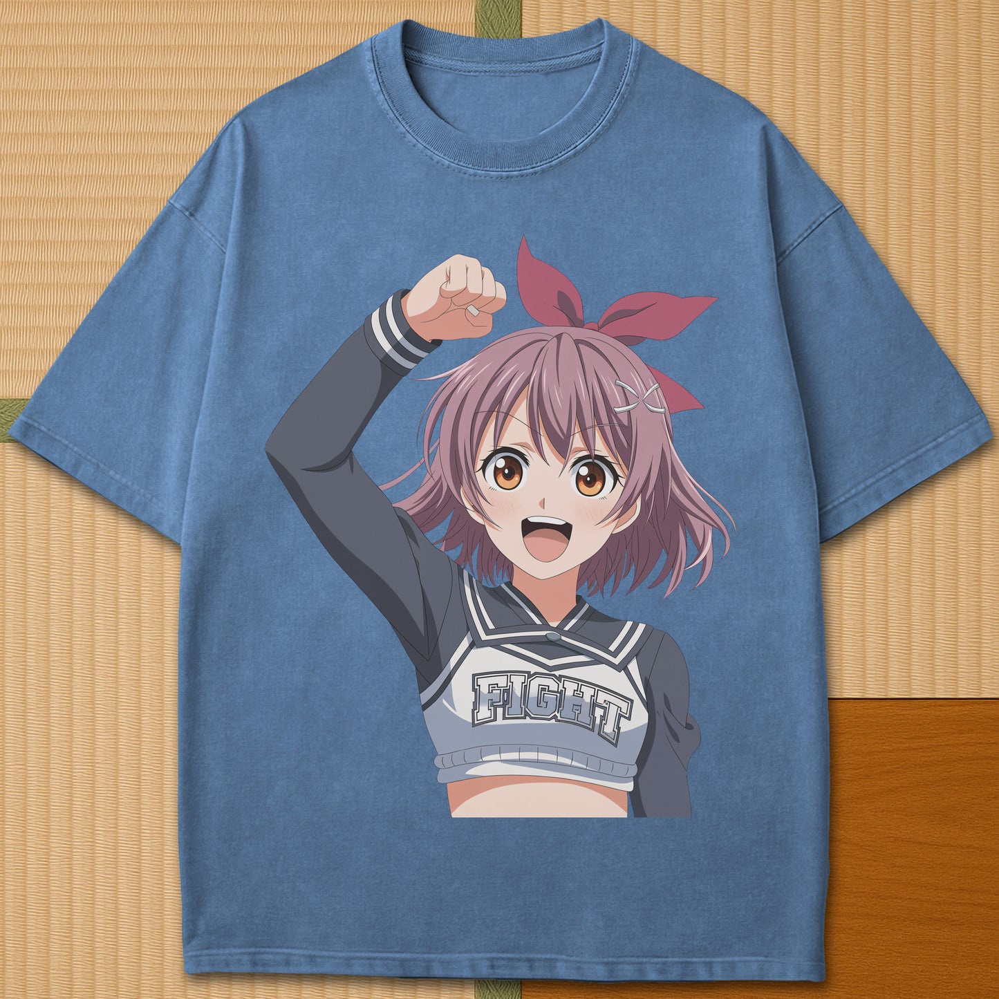 Japanese-inspired cotton Anime Cheerleader T-Shirt in Blue Jean on Comfort Colors 1717, styled in a modern flatlay scene.