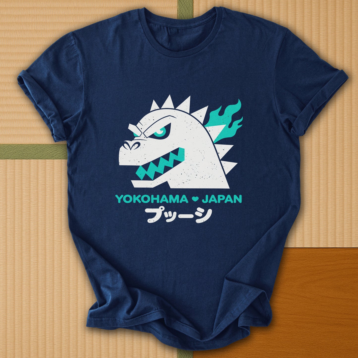 Japanese-inspired cotton Vintage Kaiju Godzilla T-Shirt in Navy on Gildan 64000, styled in a modern flatlay scene
