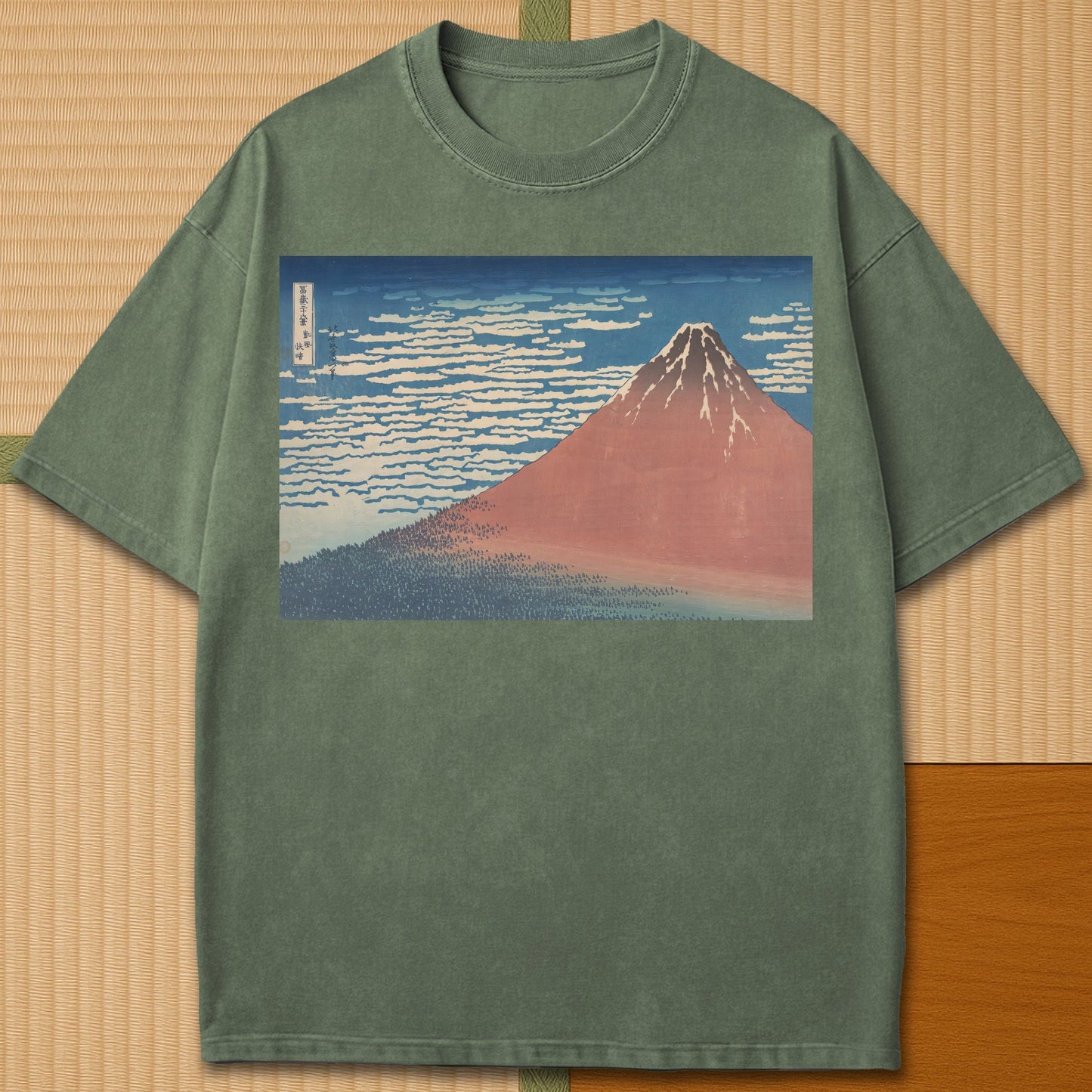 Japanese-inspired cotton Red Fuji By Hokusai T-Shirt in Moss on Comfort Colors 1717, styled in a modern flatlay scene.