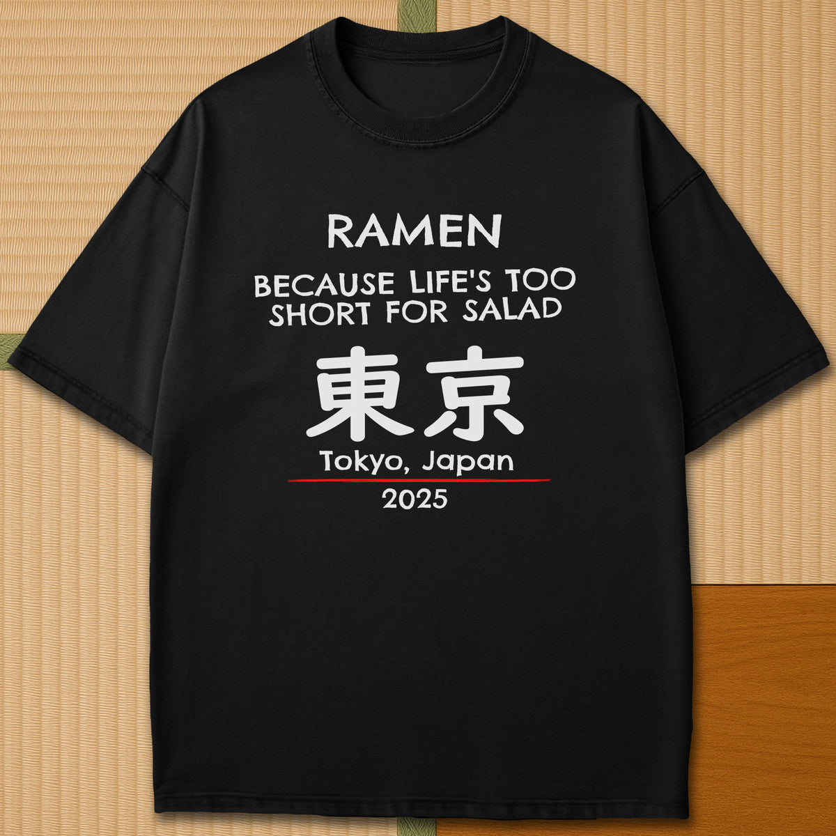 Japanese-inspired cotton Ramen Tokyo T-Shirt in Black on Comfort Colors 1717, styled in a modern flatlay scene.