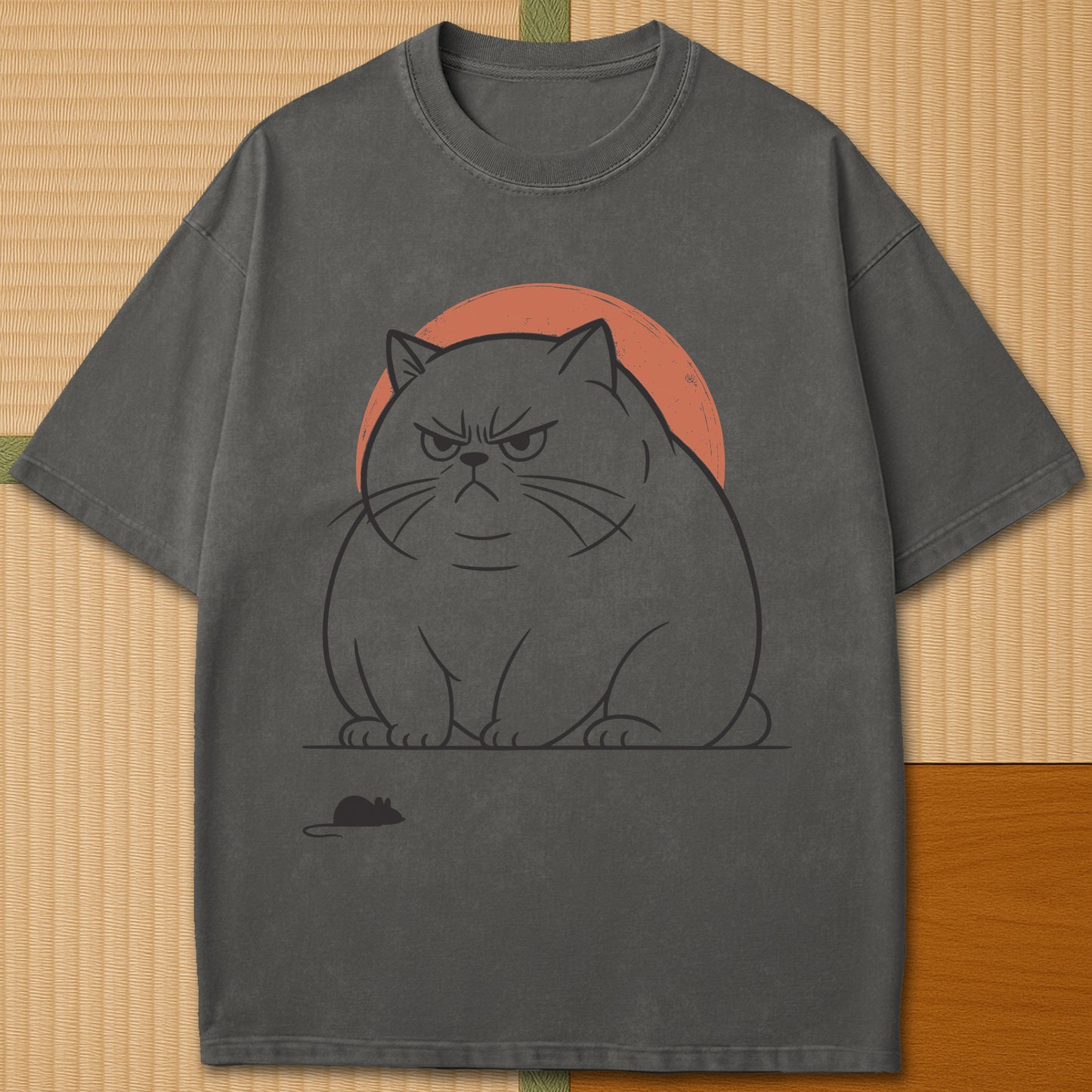 Japanese-inspired cotton Grumpy Cat Standoff T-Shirt in Pepper on Comfort Colors 1717, styled in a modern flatlay scene.