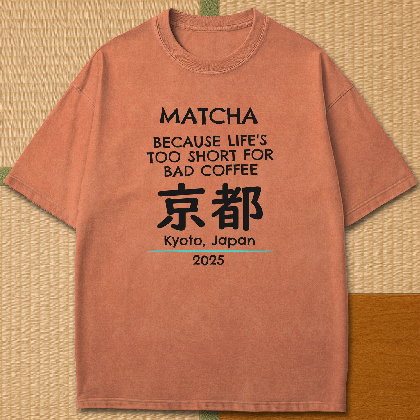 Japanese-inspired cotton Matcha Tokyo T-Shirt in Yam on Comfort Colors 1717, styled in a modern flatlay scene.