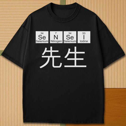 Japanese-inspired cotton Sensei Periodic Table T-Shirt in Black on Comfort Colors 1717, styled in a modern flatlay scene.