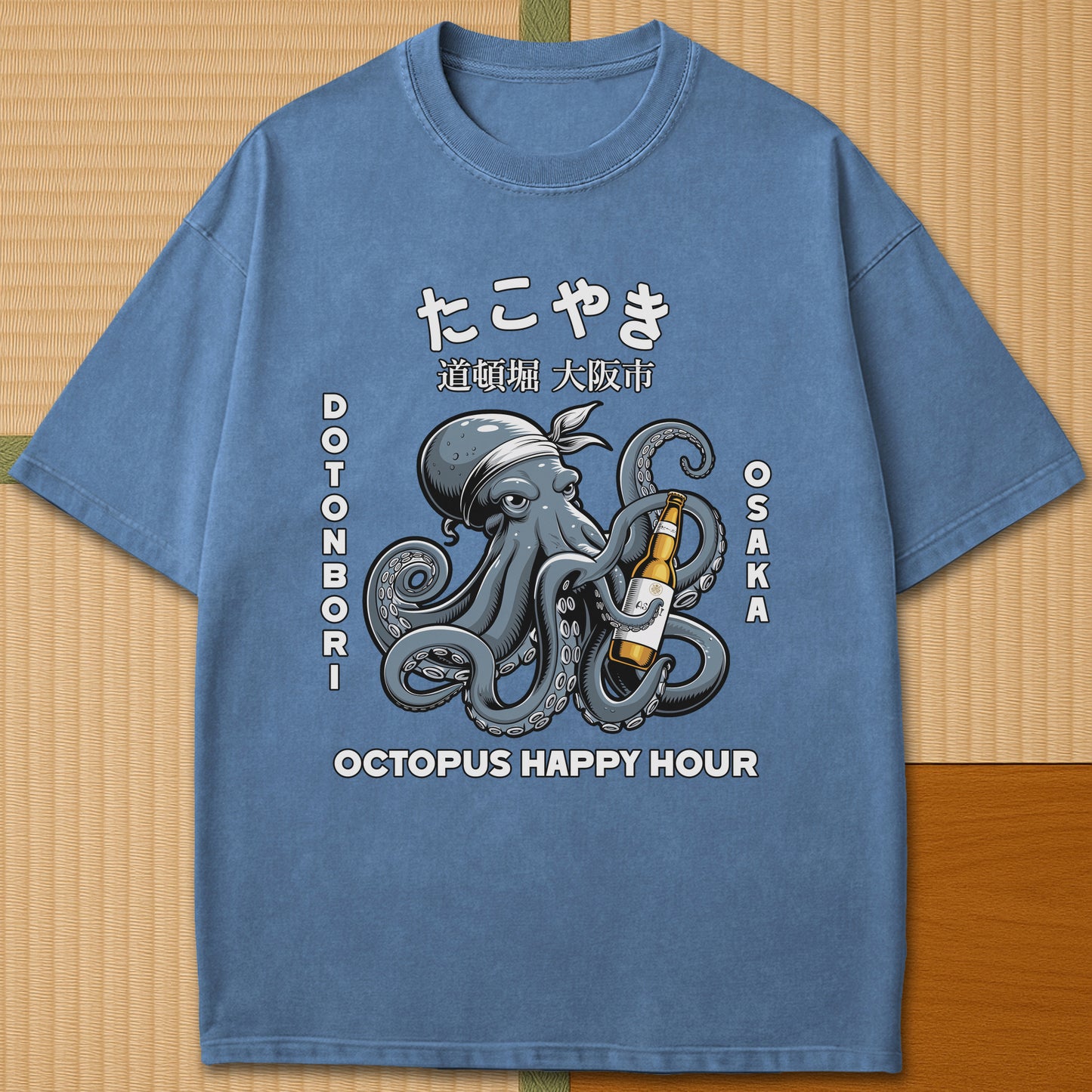 Japanese-inspired cotton Dotonbori Takoyaki T-Shirt in Blue Jean on Comfort Colors 1717, styled in a modern flatlay scene.
