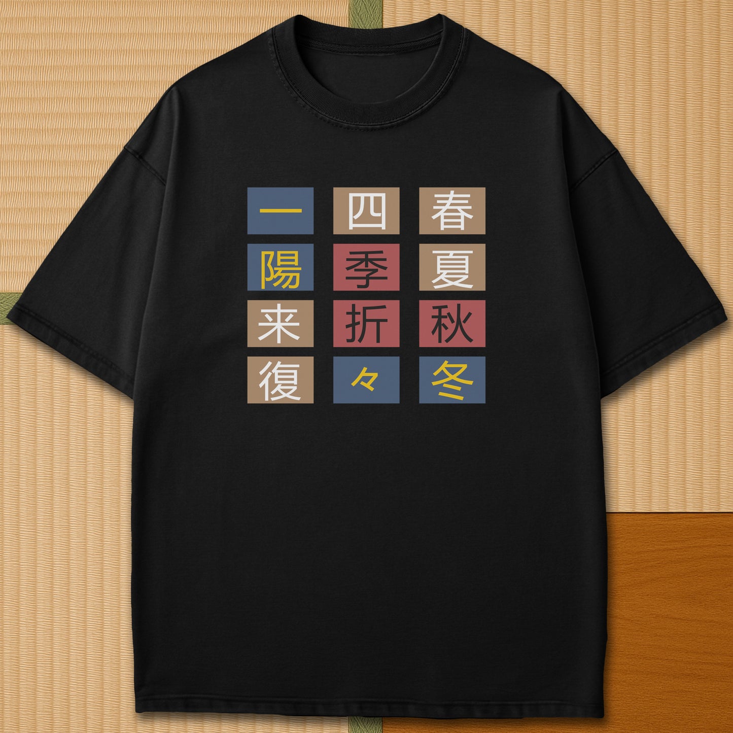 Japanese-inspired cotton The Seasons T-Shirt in Black on Comfort Colors 1717, styled in a modern flatlay scene.