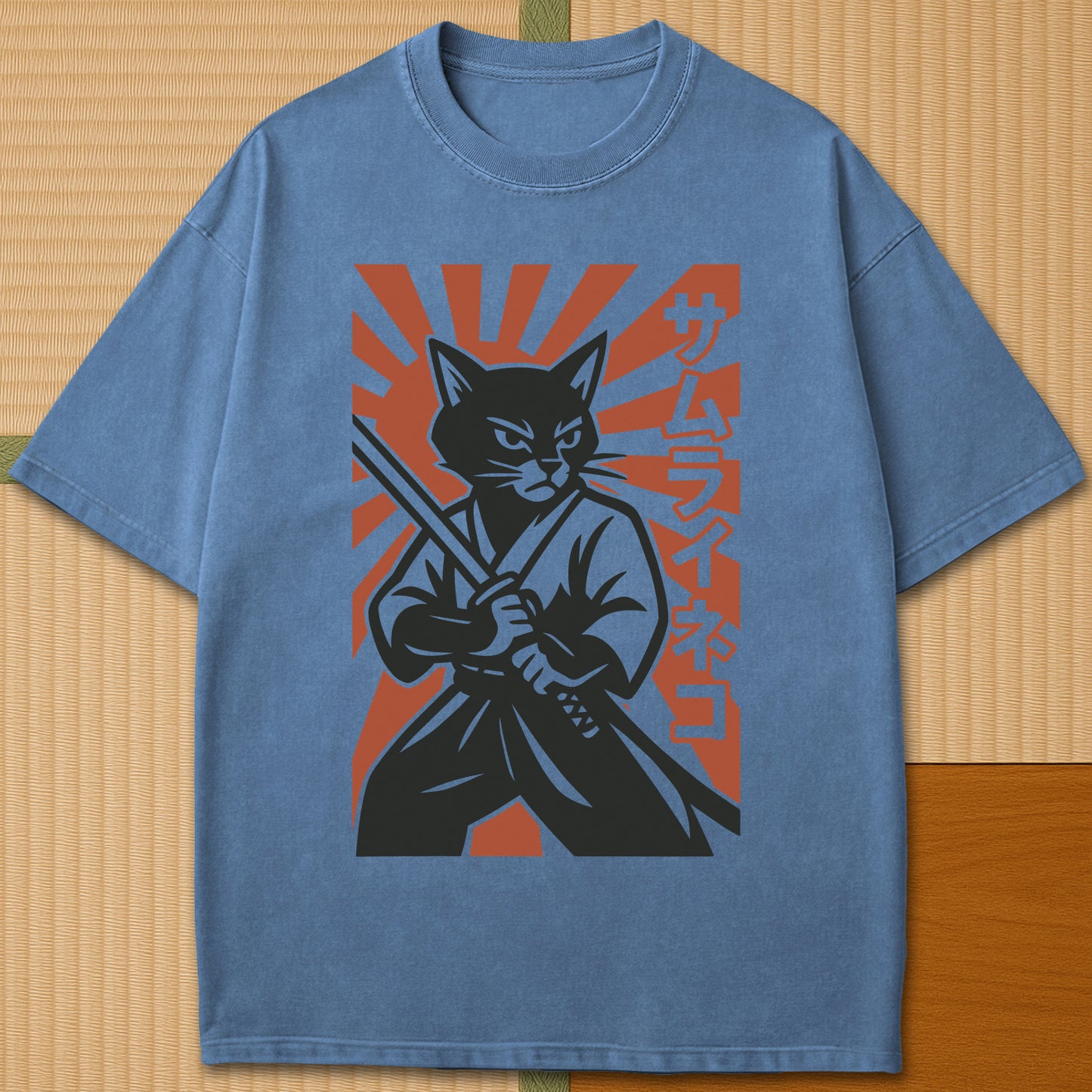 Japanese-inspired cotton Samurai Neko Rising T-Shirt in Blue Jean on Comfort Colors 1717, styled in a modern flatlay scene.