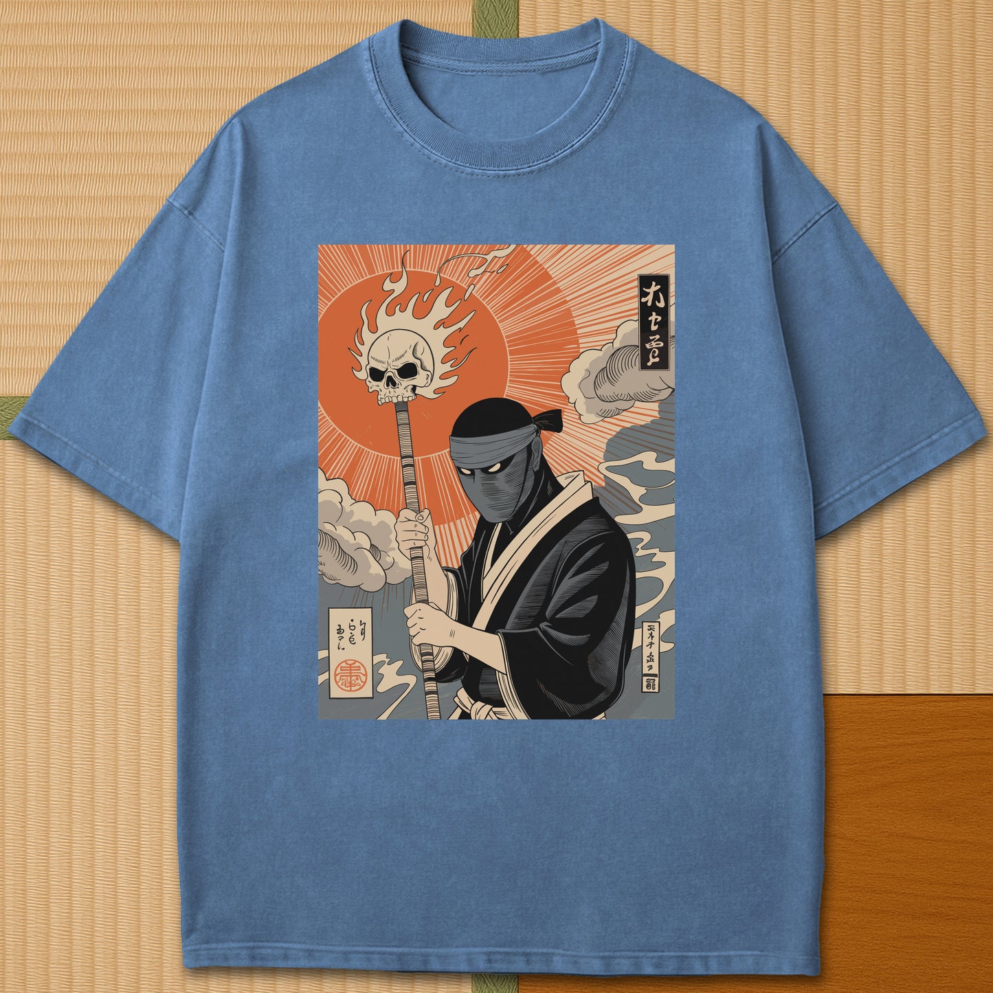 Japanese-inspired cotton Burnt Sun Ninja Vintage Japanese Folklore T-Shirt in Blue Jean on Comfort Colors 1717, styled in a modern flatlay scene.